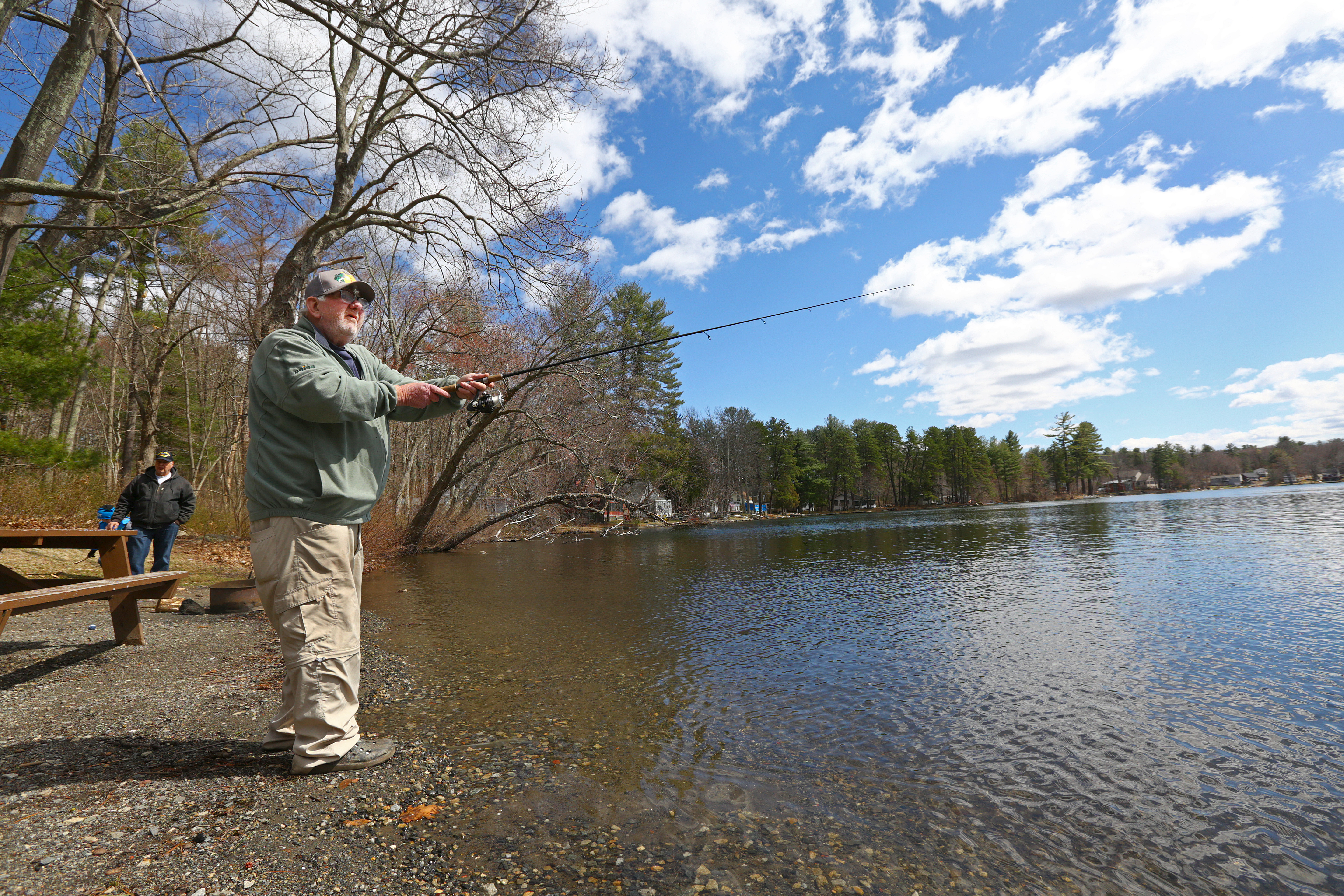 After the release, 75-year-old Bob Sweeney, of Lawrence, cast with a lure.