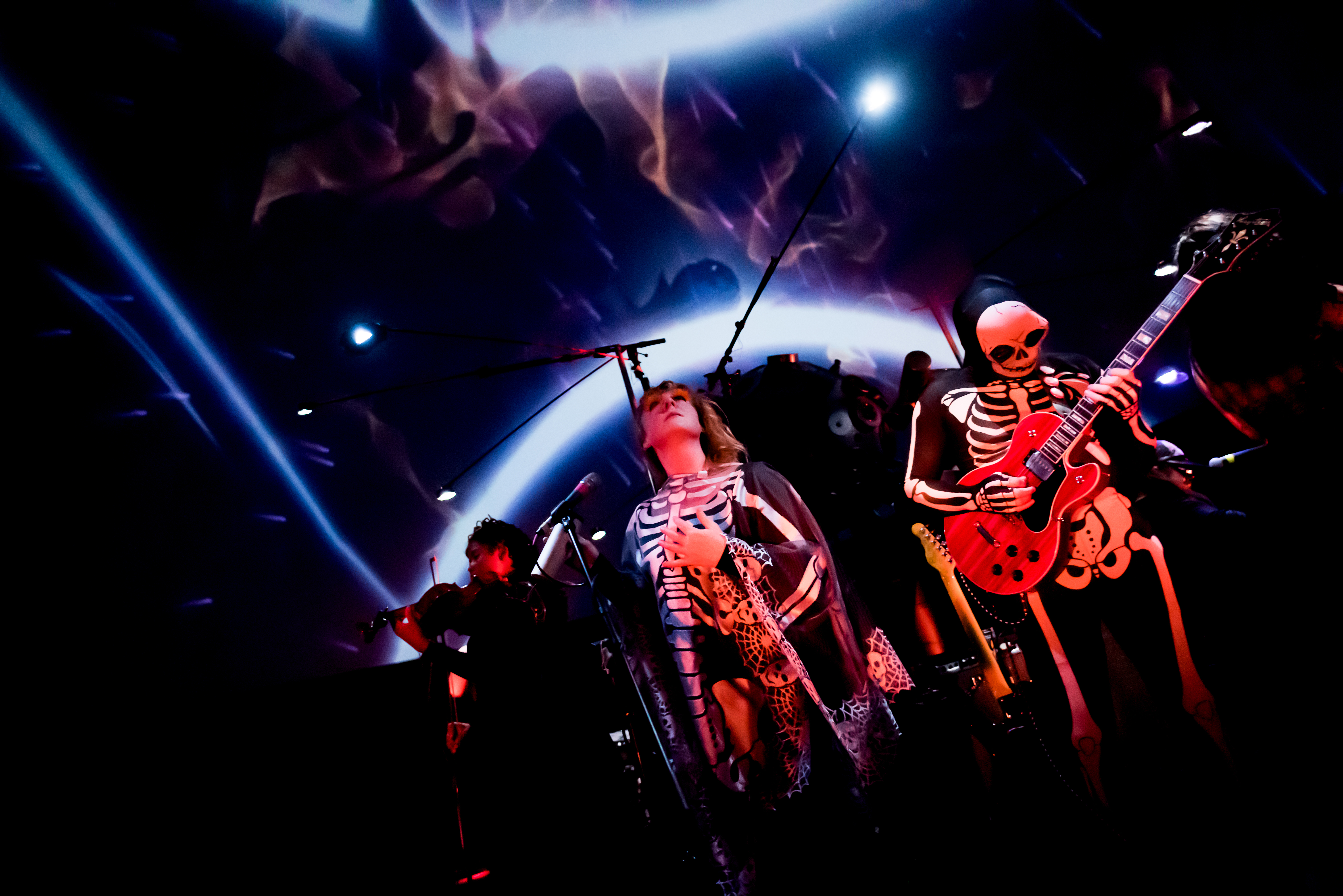 Walter Sickert & the Army of Broken Toys performed at the Museum of Science's Hayden Planetarium in 2019.