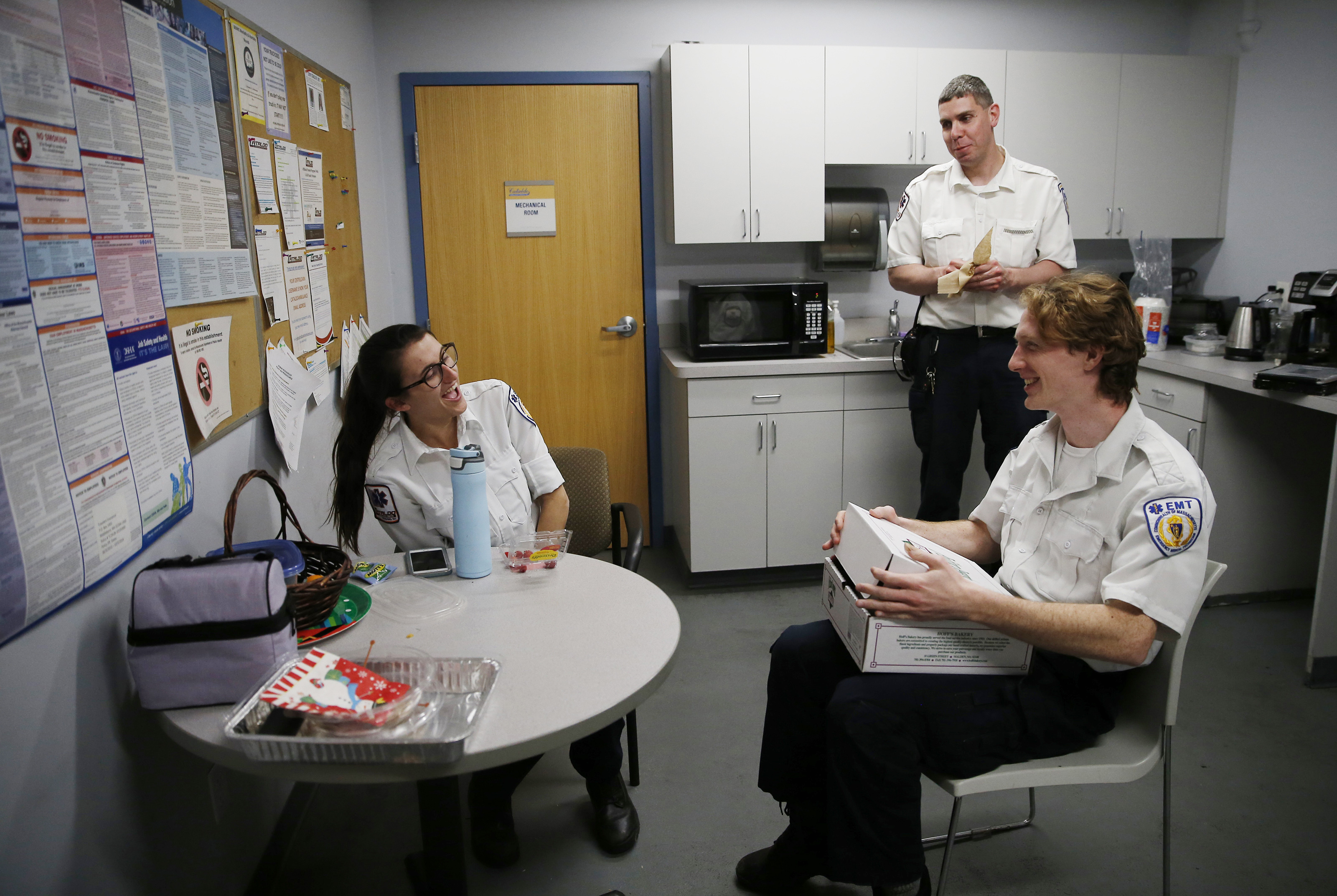 Monday, 9:26 pm - Fellow EMT Steve Leonard (R) joked that he bought Moran (L) a cake for her birthday, which in reality had been donated to the station by a local bakery as she and Cormio took a break.