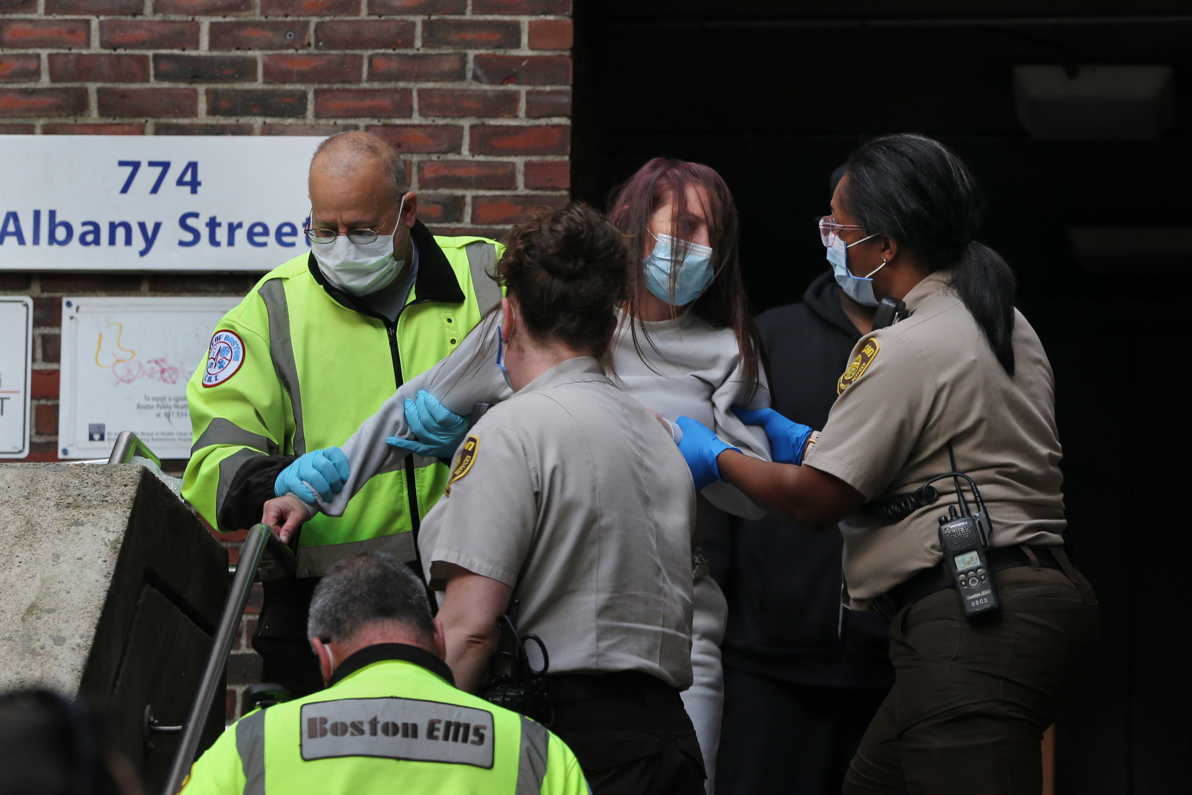 Boston emergency medical personnel cared for a woman who overdosed on Albany Street.