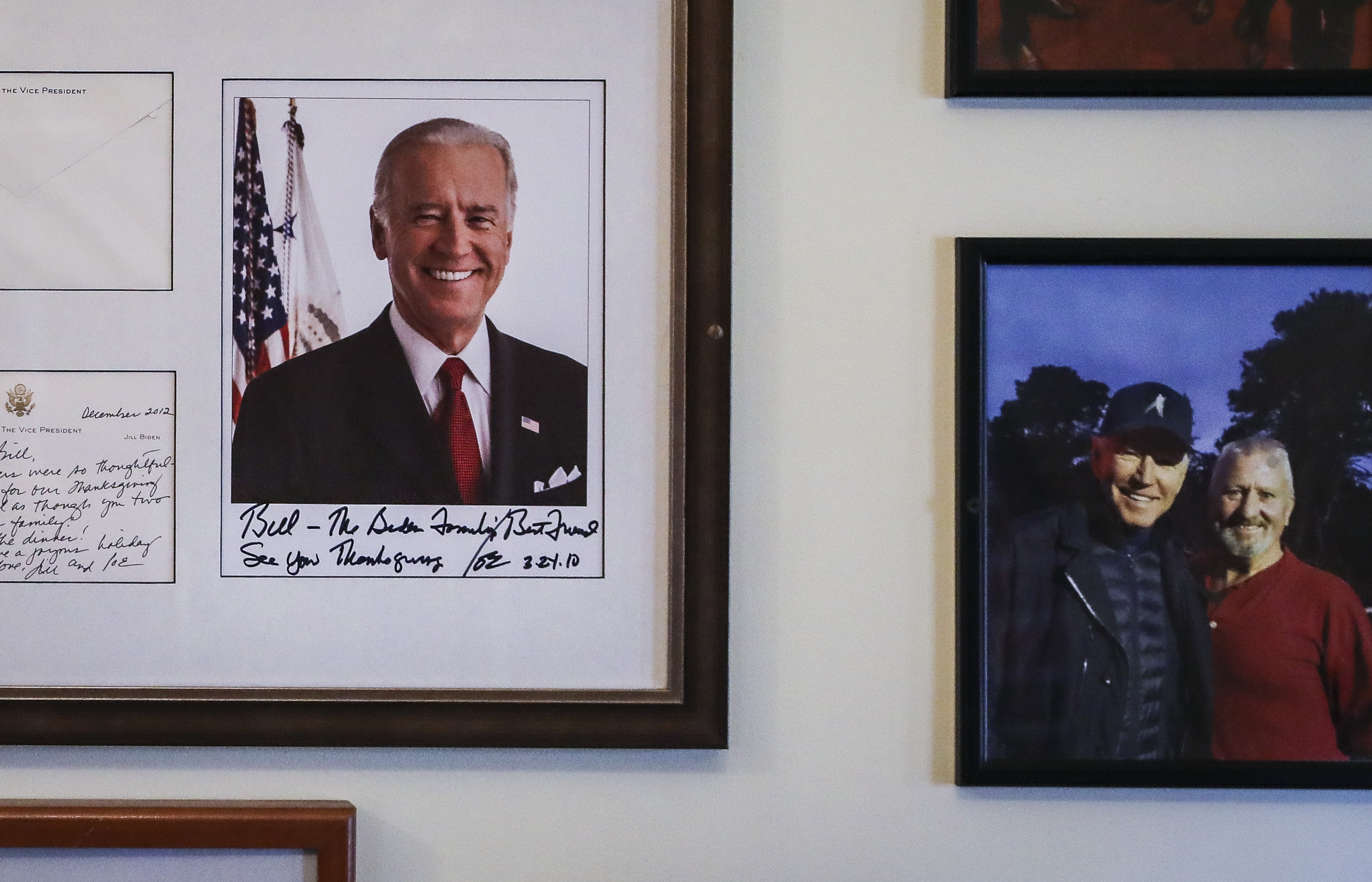 A signed photo from then Vice President Biden hung on the wall of Faregrounds Restaurant and Pudley's Pub in Nantucket on Wednesday. Written in Biden’s script is a note that reads, “See you Thanksgiving”.
