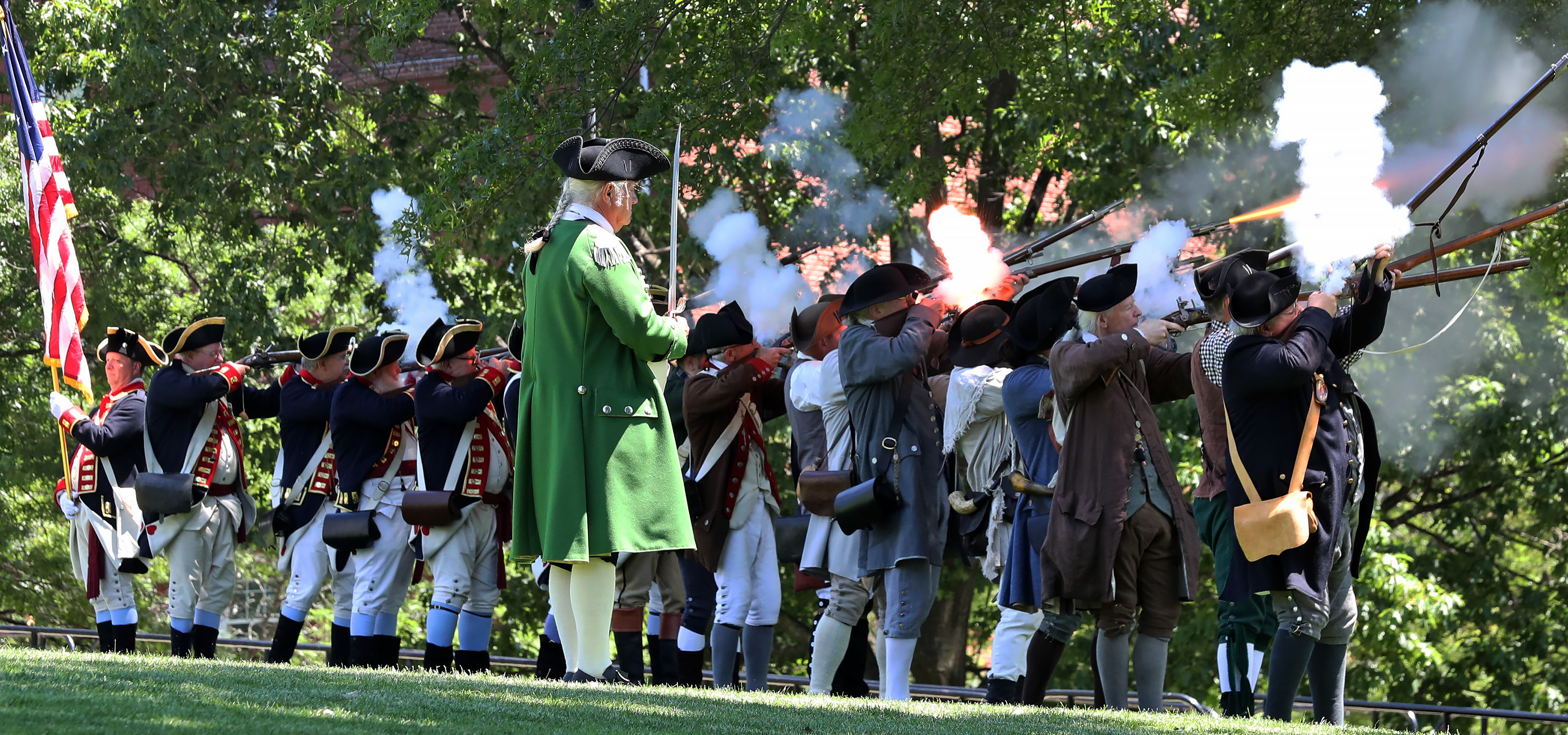 Members of the Sons of the American Revolution and Charlestown Militia Company took part in the firing of a musket salute on Bunker Hill Day in Charlestown.