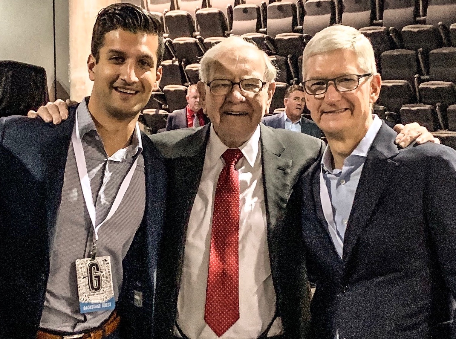 Sahil Bloom (left) with Warren Buffet and Tim Cook.