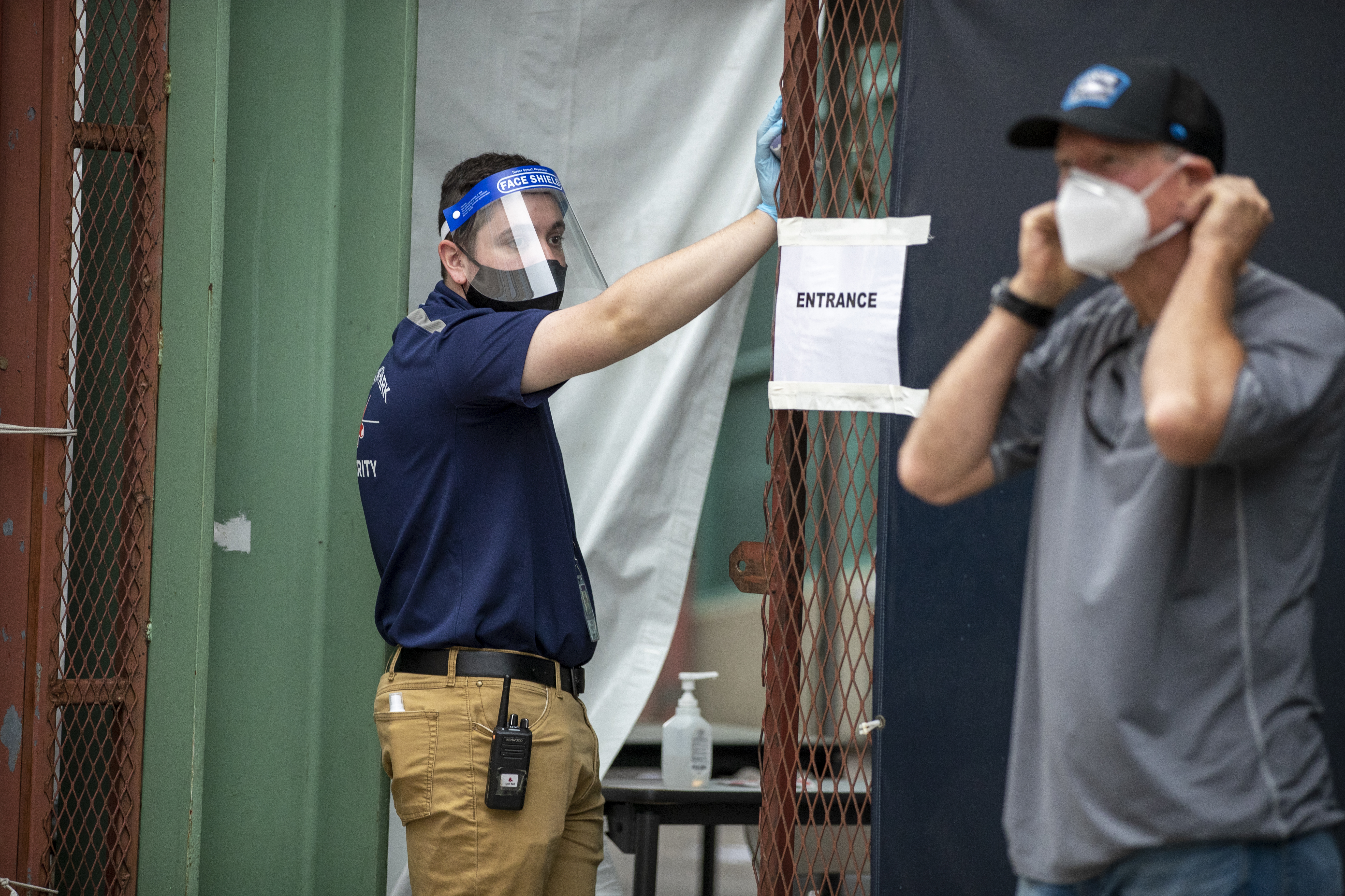 Red Sox staff wait to get tested at Fenway Park.