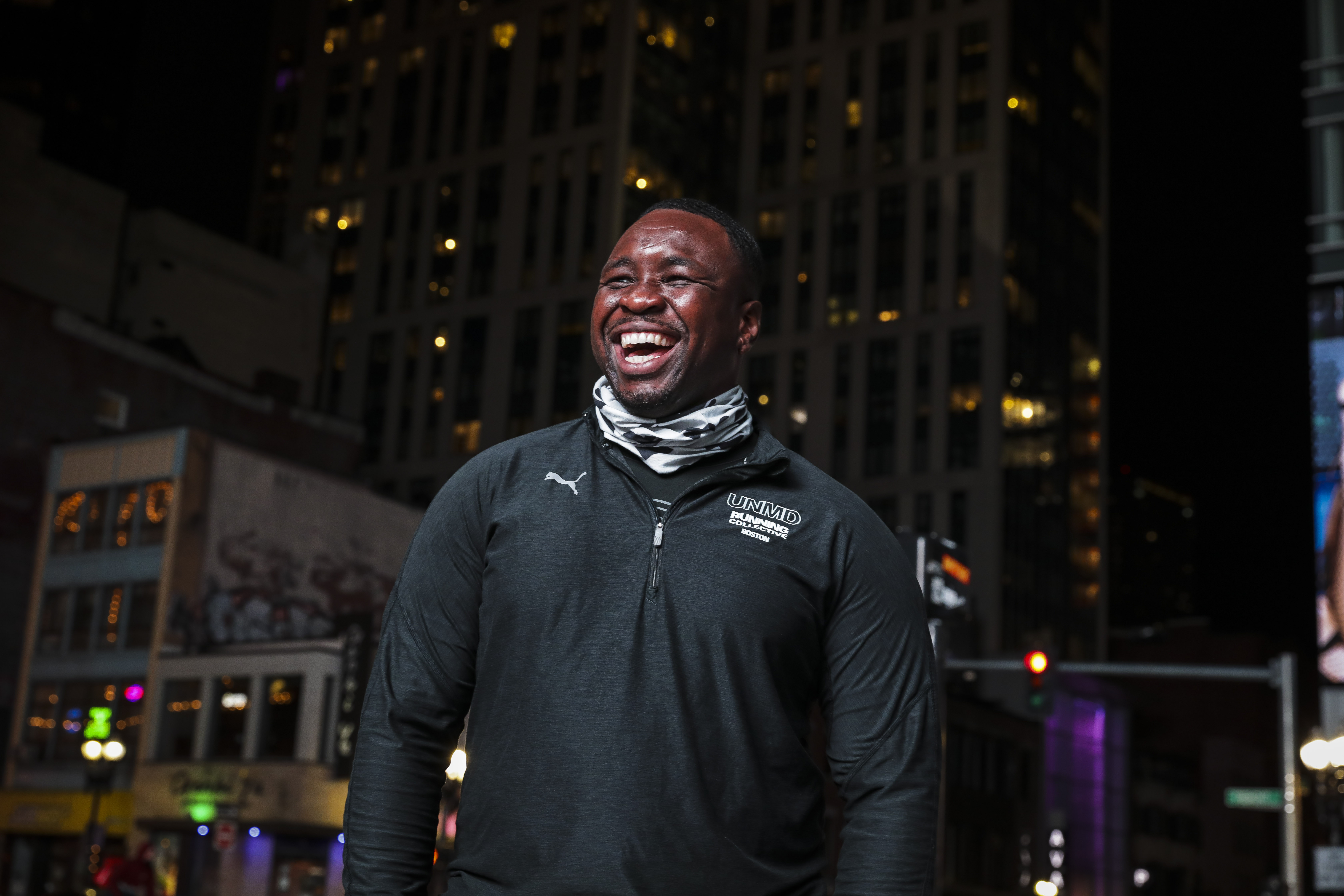 Leandrew Belnavis, founder of Unnamed Run Crew, posed for a portrait in downtown Boston. For the past five years, Belnavis has been organizing community runs as a way to protest injustice and to decolonize fitness.