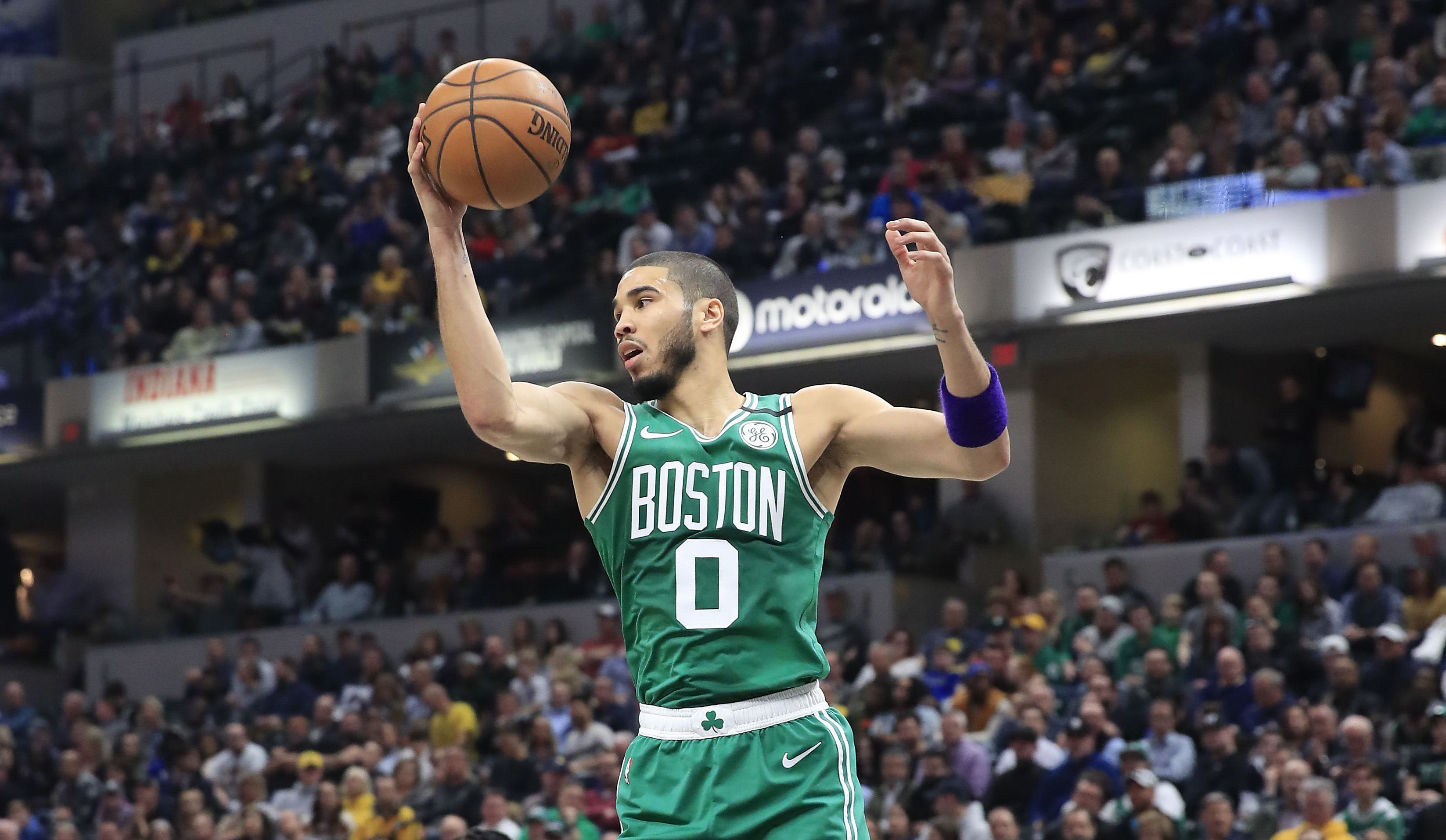 Jayson Tatum grabs a rebound in a game against the Pacers this past March.