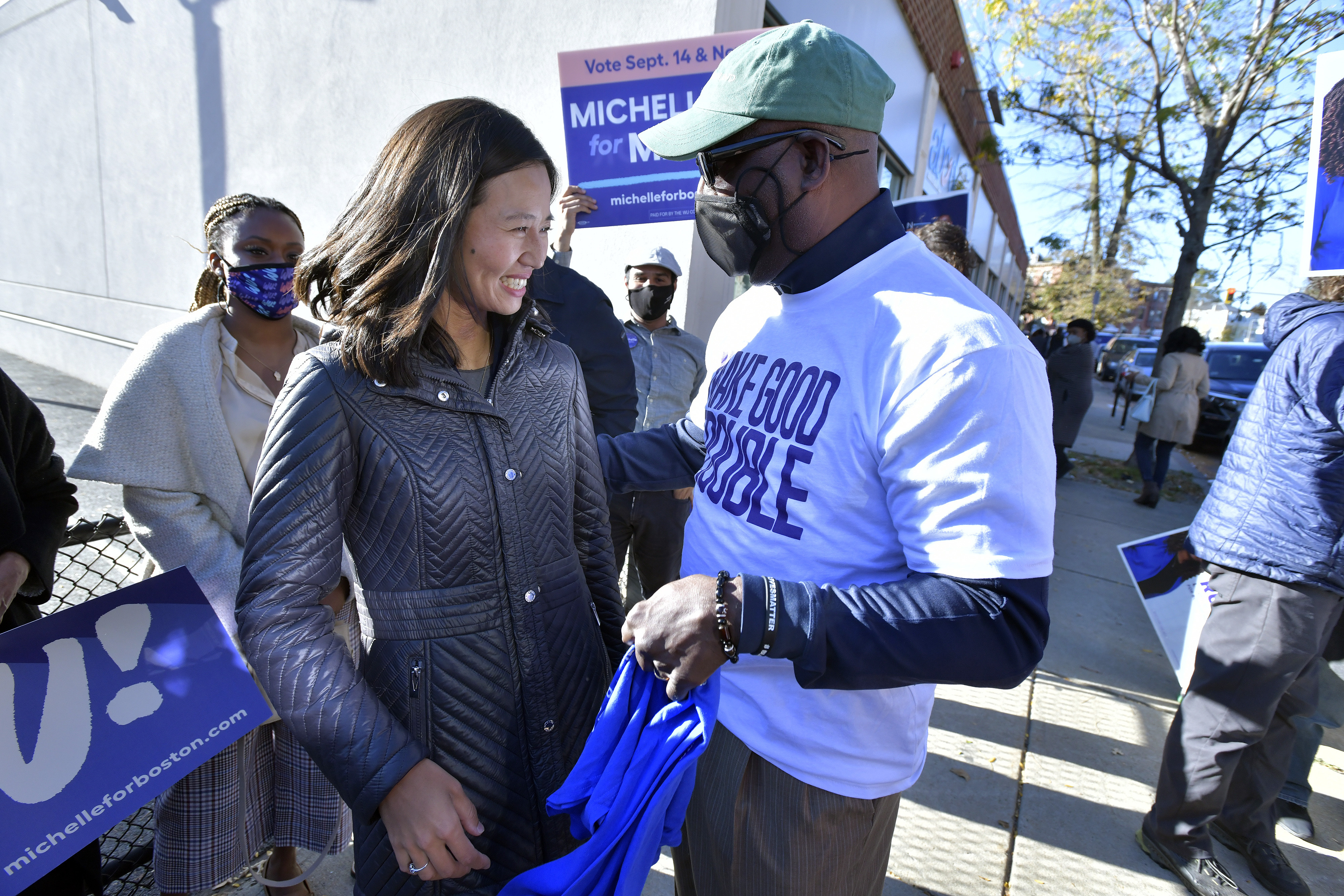 Boston mayoral candidate Michelle Wu greeted supporter Darnell Williams at a campaign event in Boston.