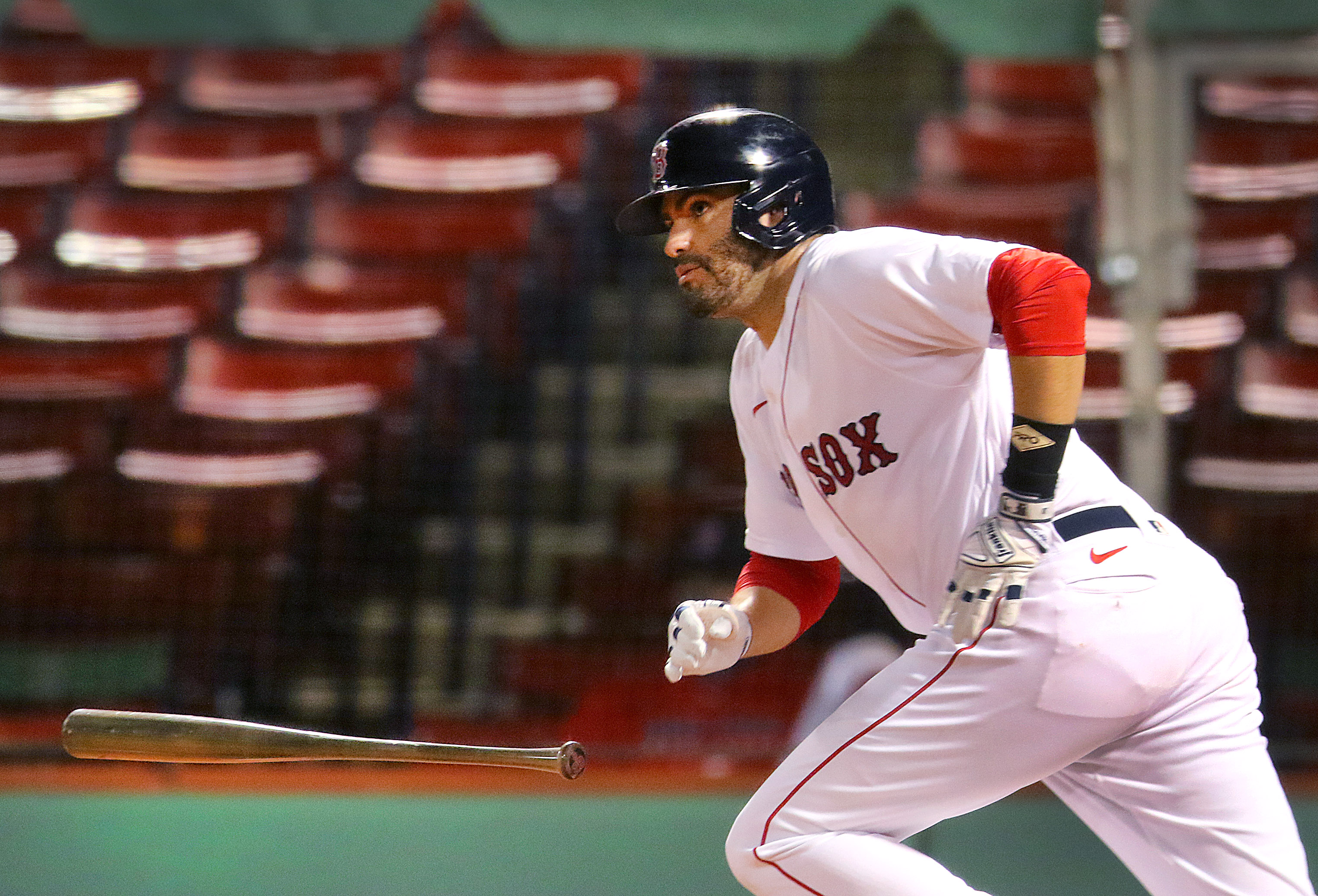 J.D. Martinez heads for first after a fourth-inning single Thursday night.