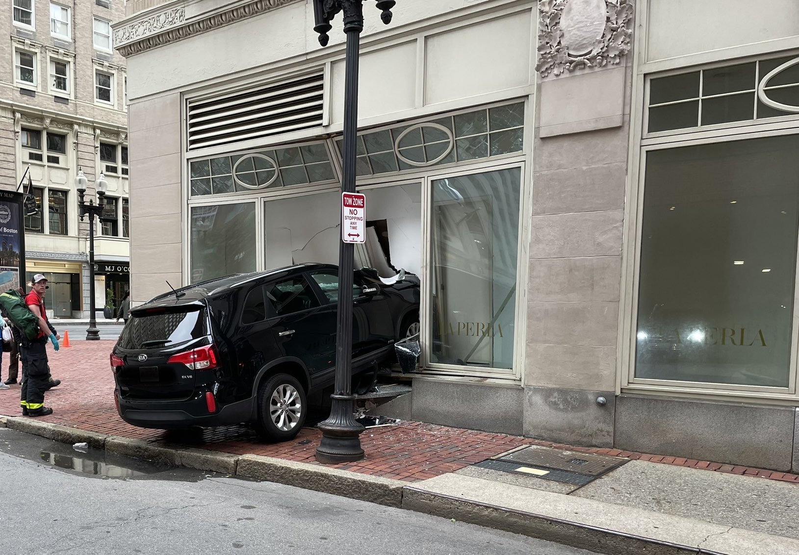 SUV crashes into front of former luxury lingerie store in Boston