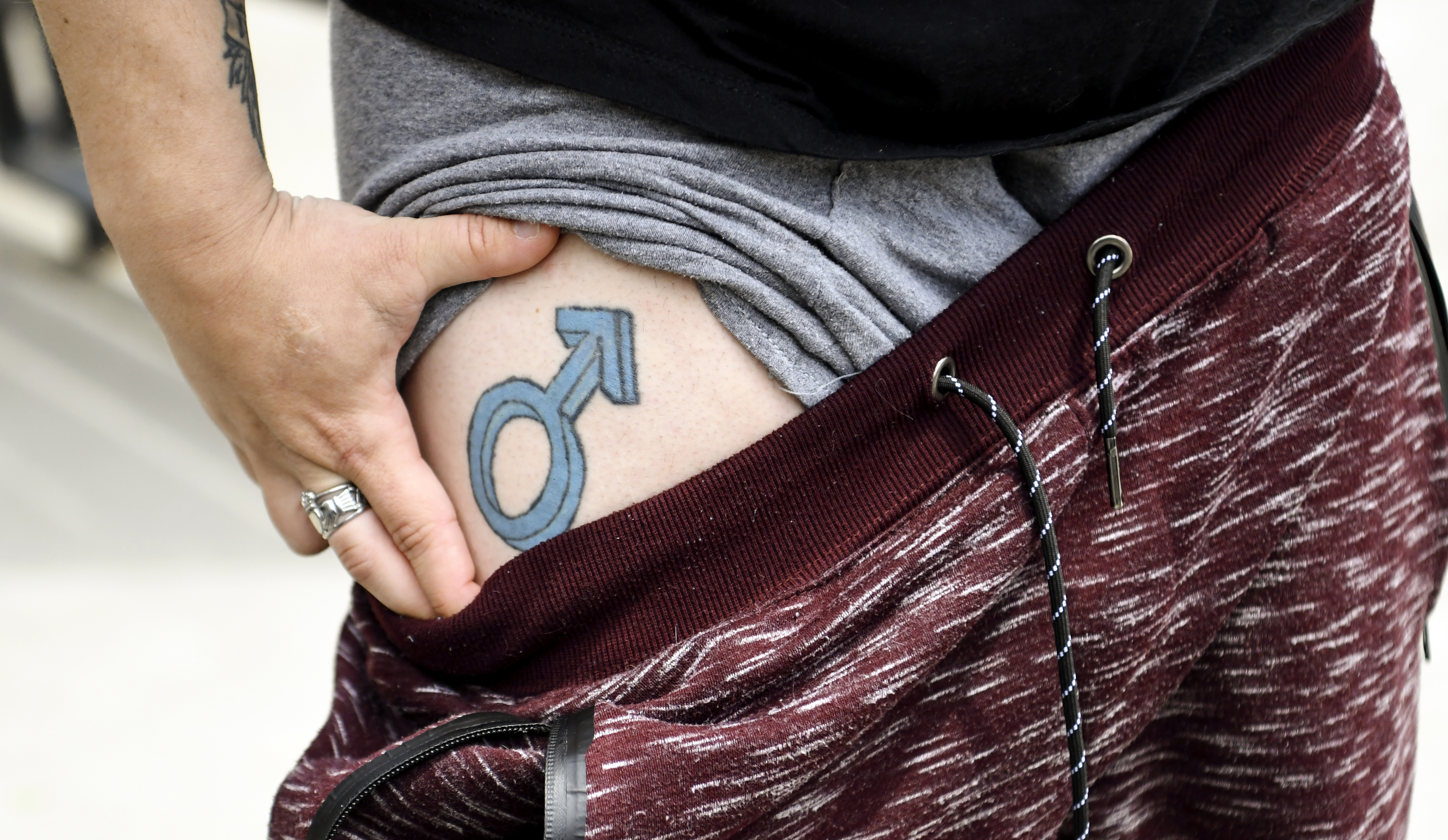 Born biologically female, Braiden Schirtzinger now identifies as nonbinary. They have a tattoo that marks the spot of their first testosterone injection at age 24.