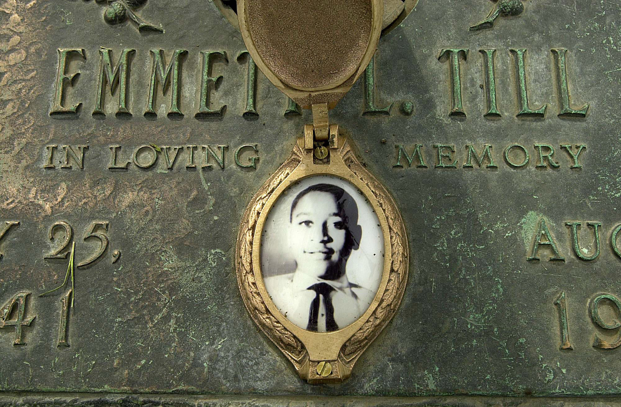 Emmett Till's photo on his grave marker in Alsip, Ill.