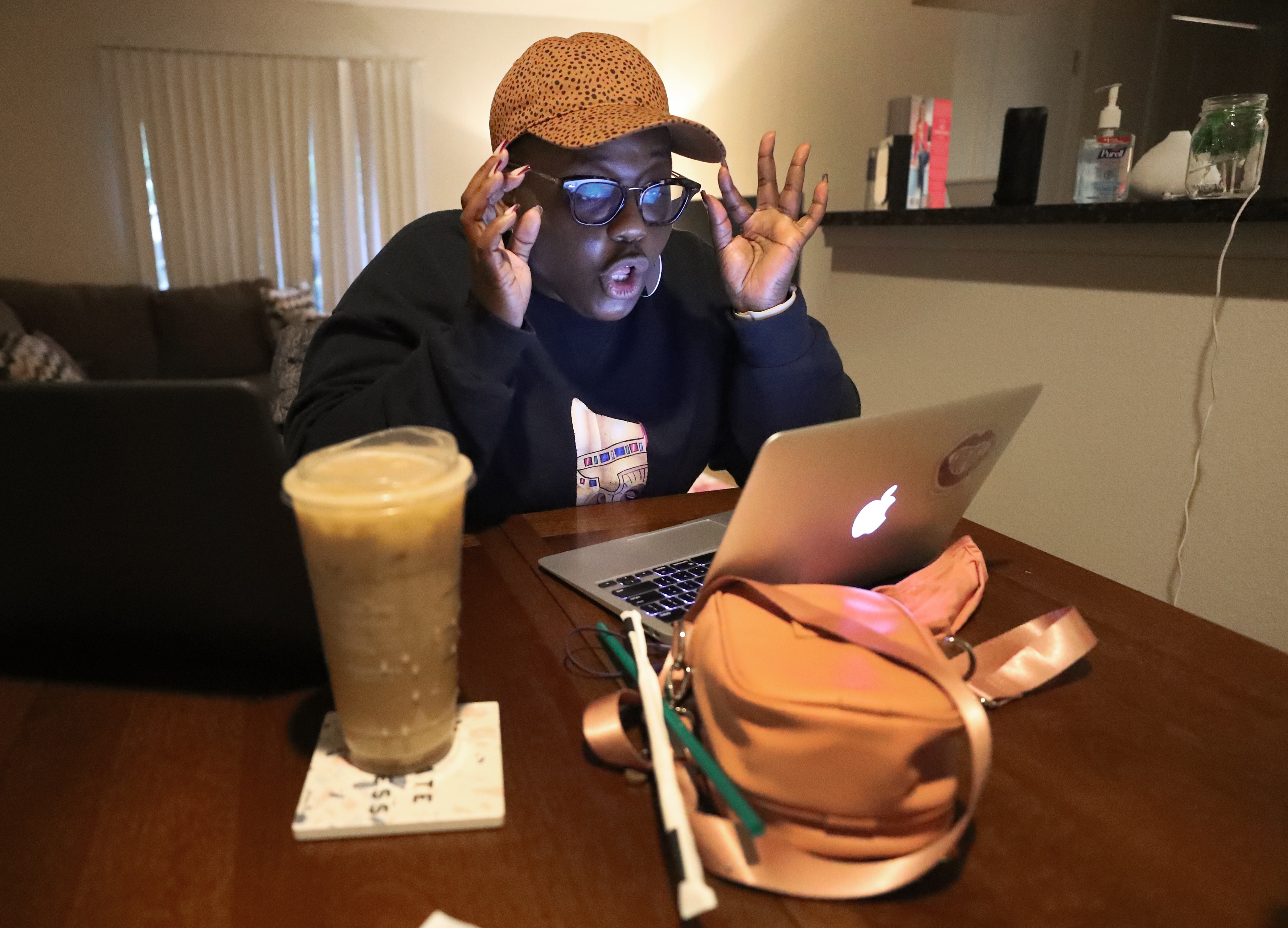 At her home seated by the kitchen table, Adrianna Barnes interacted with her students.