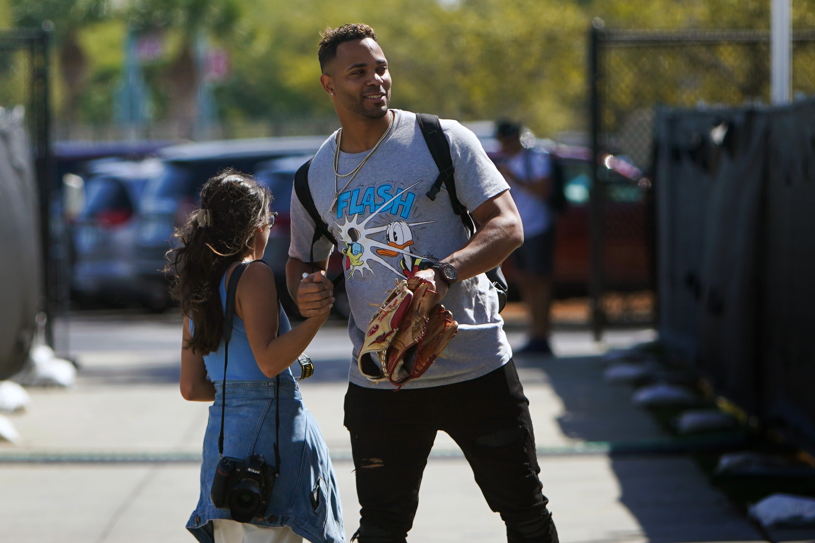 Xander Bogaerts greets a team photographer upon arriving at spring training Monday.
