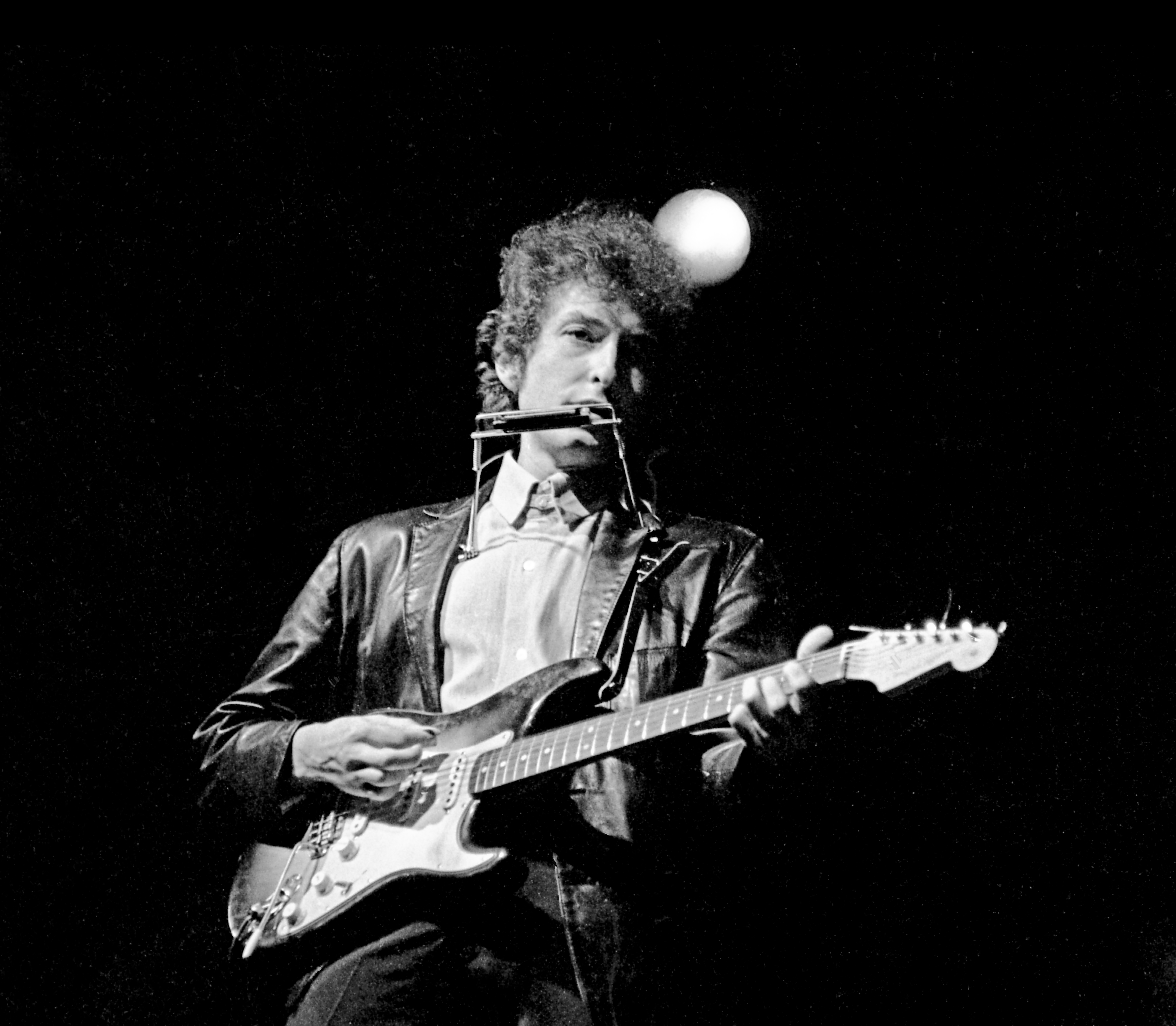 Bob Dylan went electric at the Newport Folk Festival on July 25, 1965. From "Dylan Goes Electric! Newport, Seeger, Dylan, and the Night That Split the Sixties" by Elijah Wald.