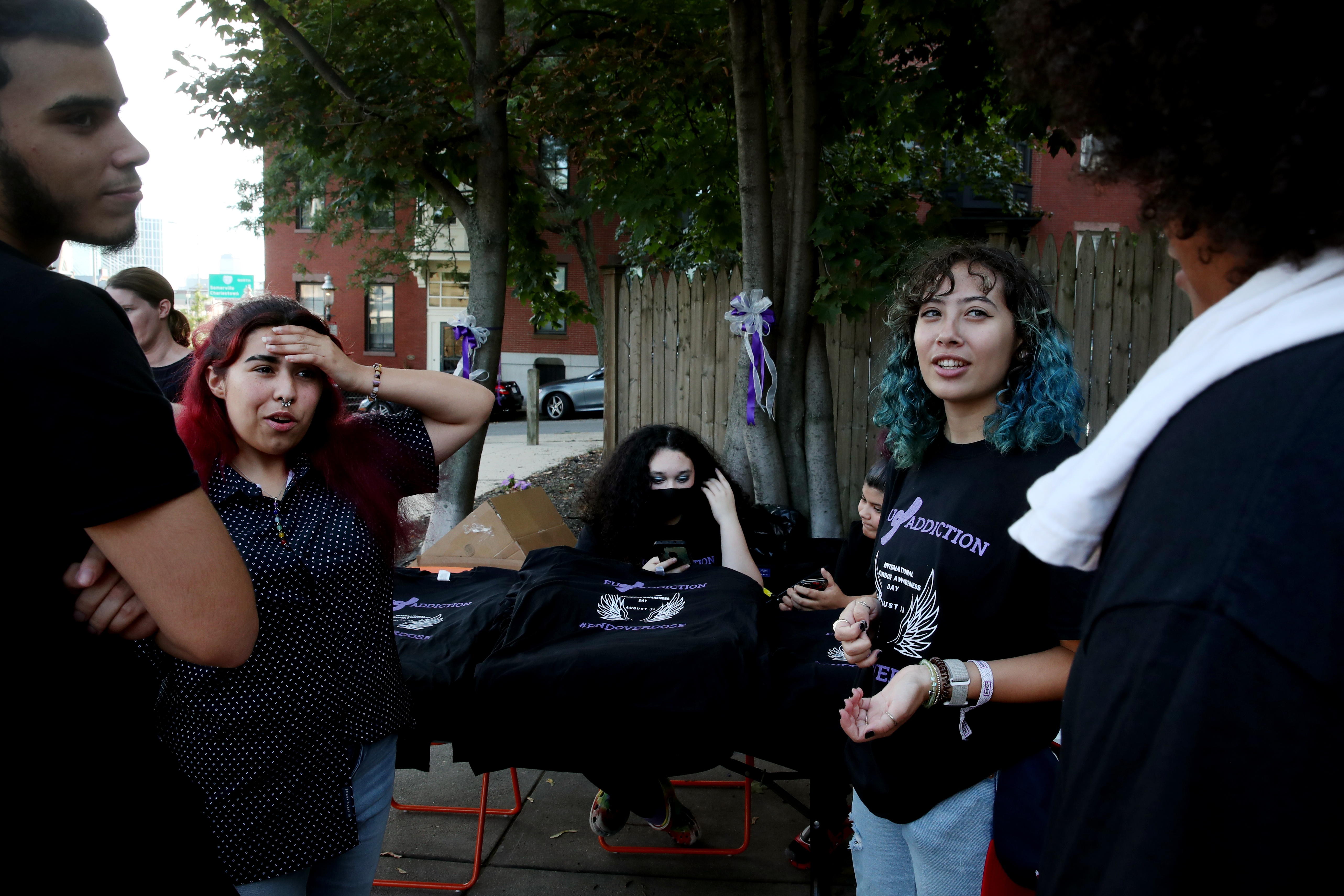 Serennity Figueroa, second from left, talked with friends from Turn It Around, a Charlestown youth program that helped her recover from mental-health struggles during the pandemic.