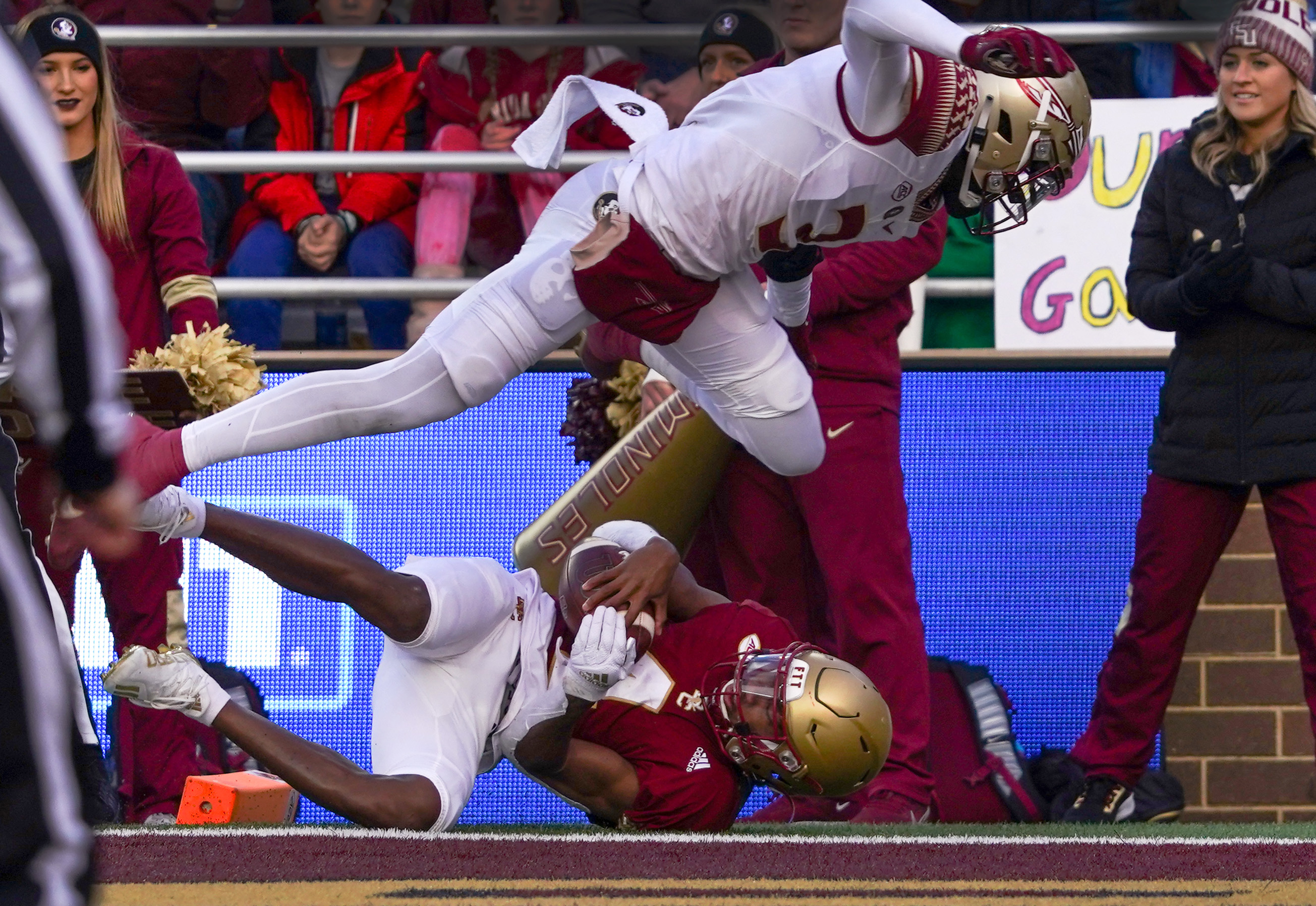 Boston College wide receiver Zay Flowers is in the end zone beating Florida State defensive back Jarvis Brownlee Jr. for a touchdown reception that brought the Eagles within three points of FSU 23-26 late in the fourth quarter.