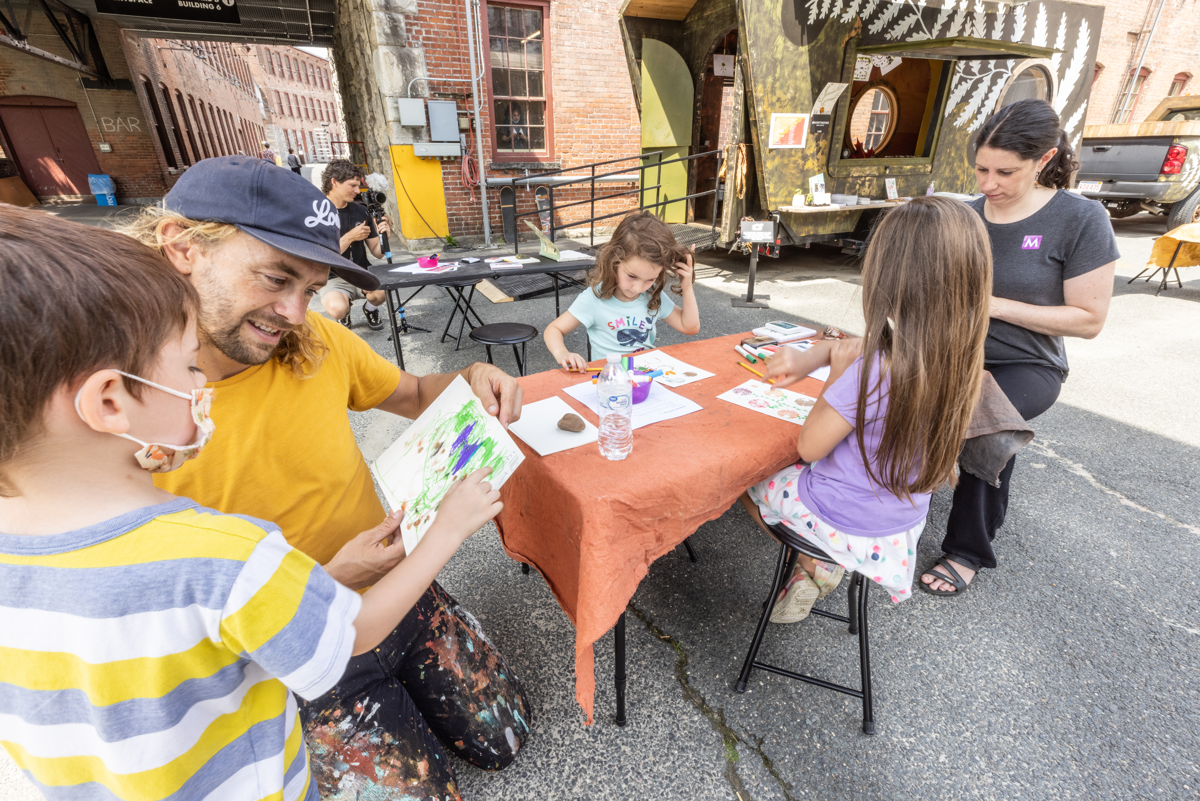 Artist Wes Bruce led children through an art-making activity last weekend.