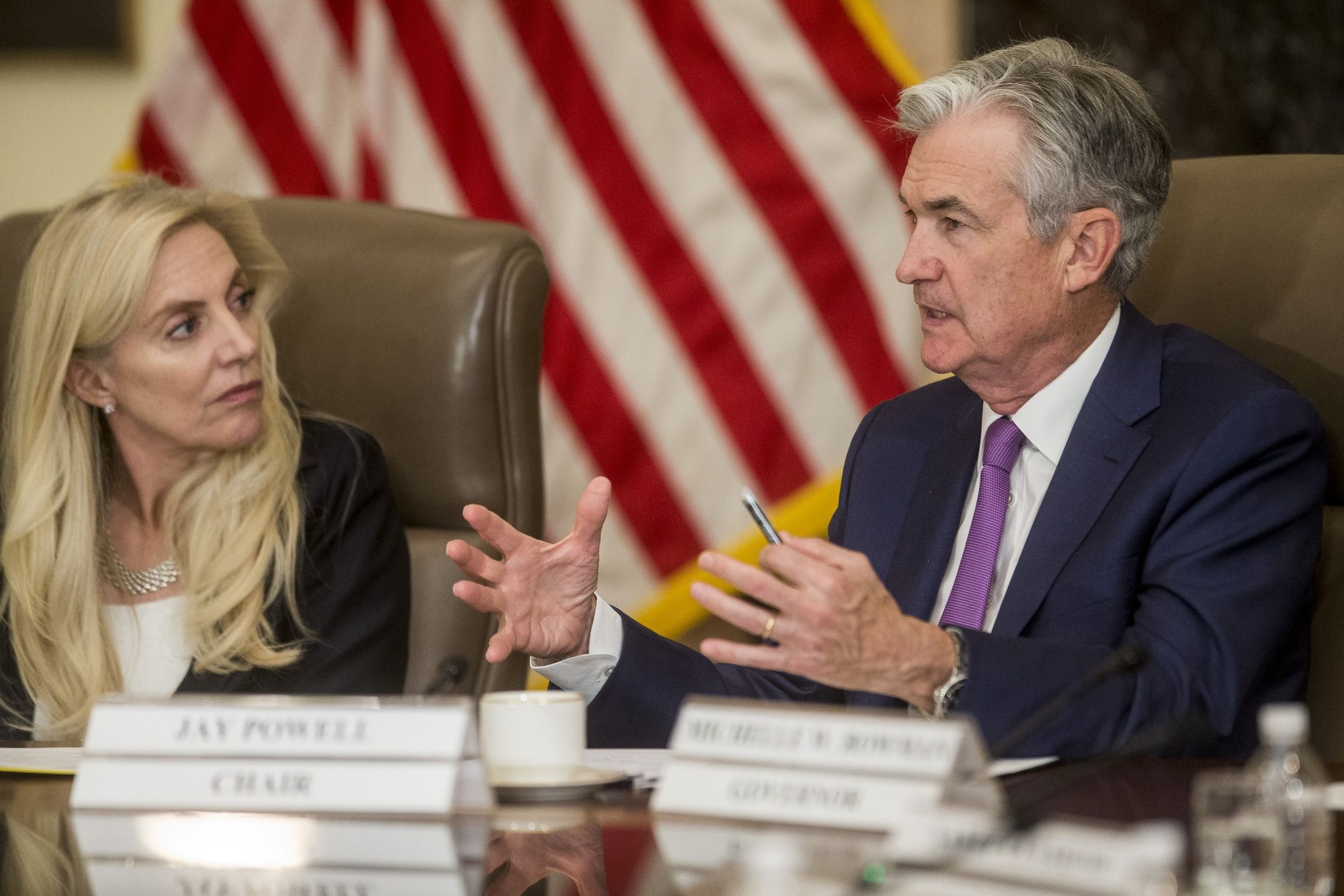 Federal Reserve Chair Jerome Powell (right) has called the Delta variant a "near-term" risk to the US economy. Powell's four-year term as head of the central bank is up in February.