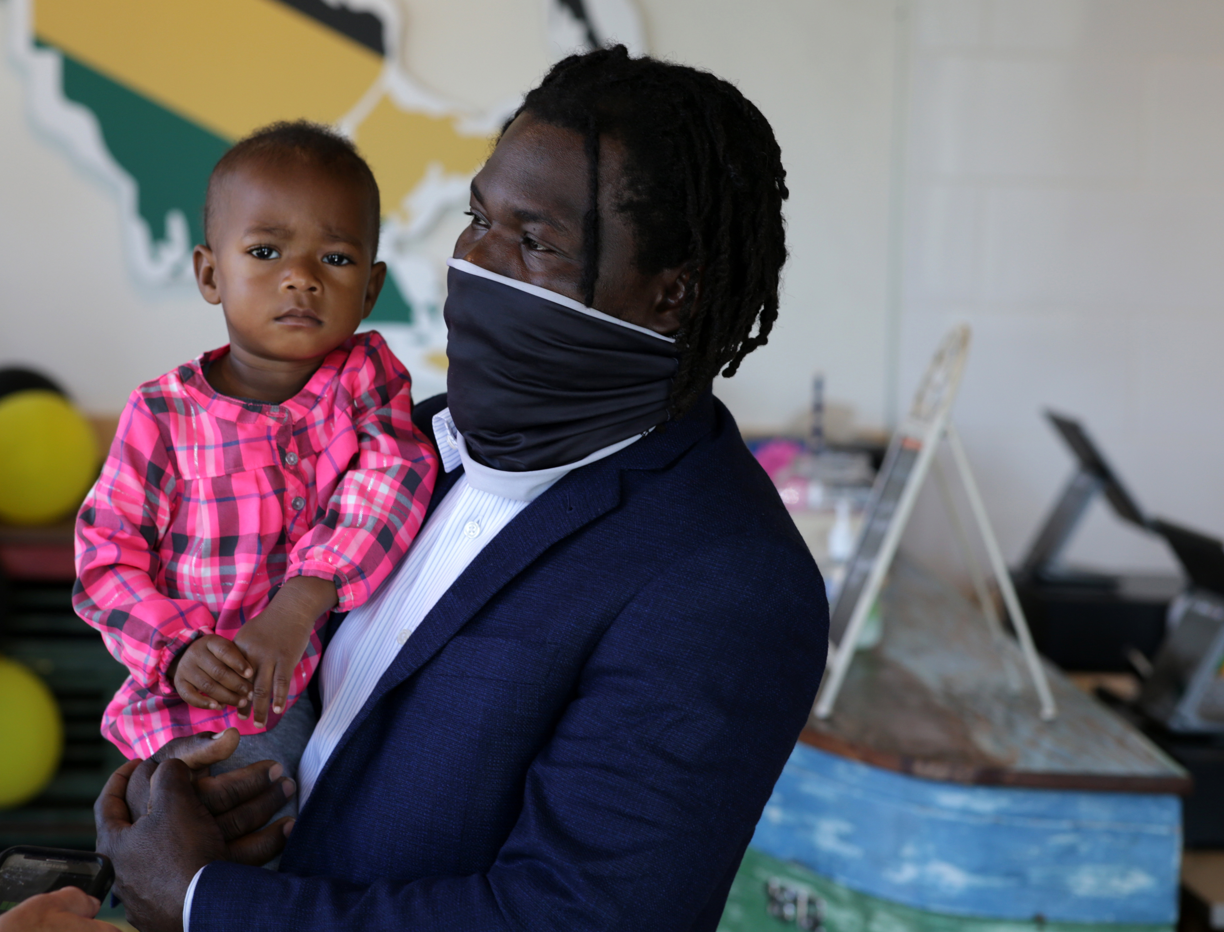 Jamaica Mi Hungry owner Ernie Campbell and his daughter Amina.