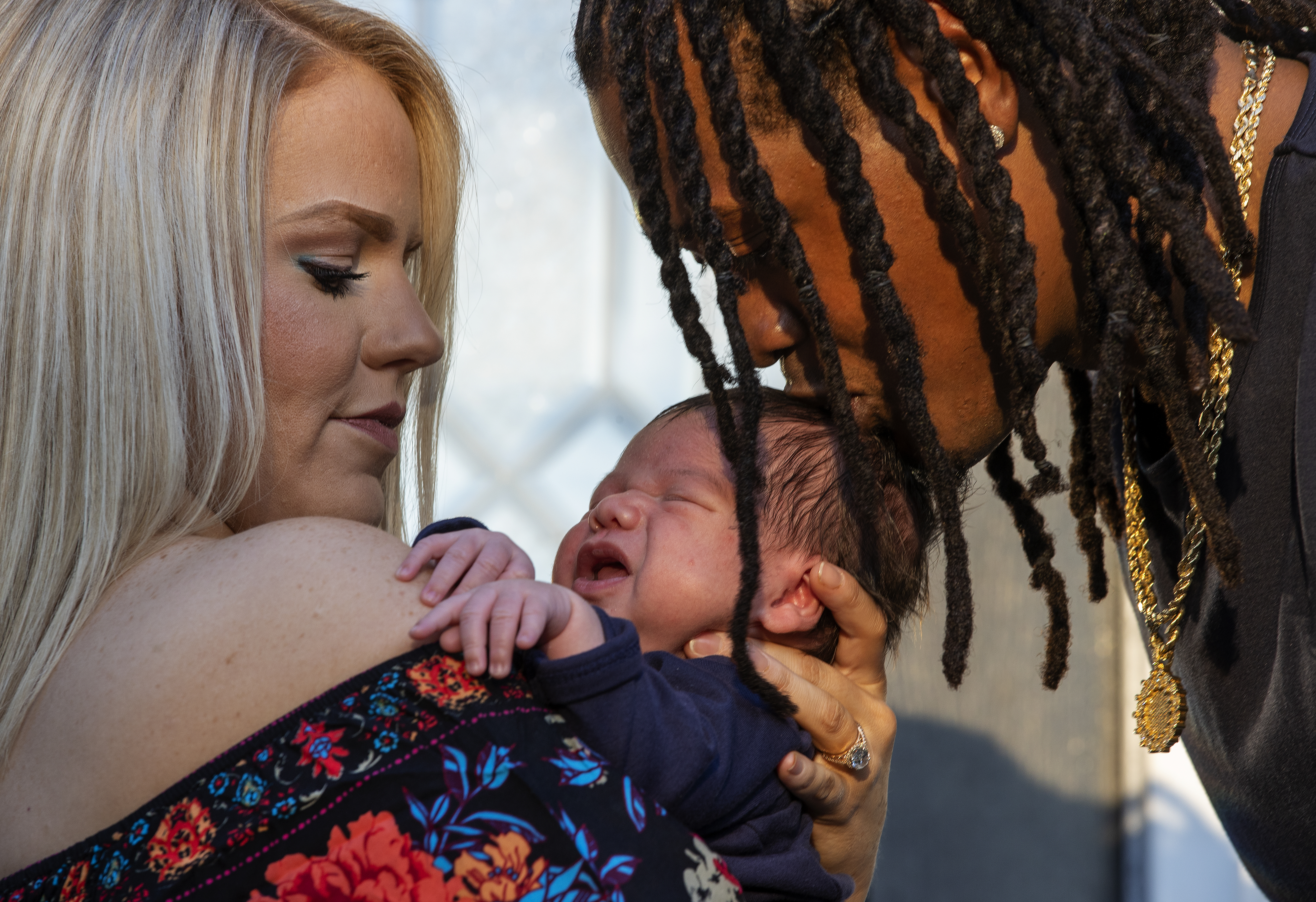 Dont'a Hightower and his fiancee Morgan Hart with their son Grayson.