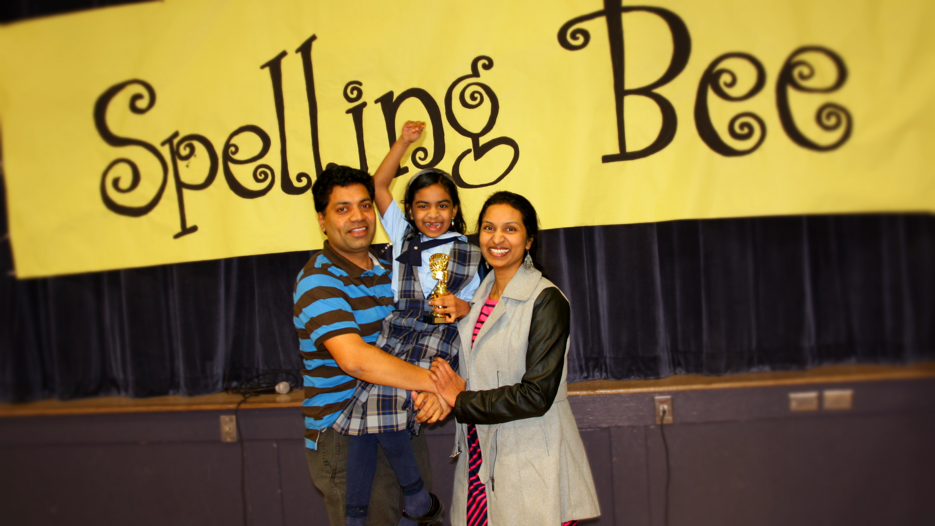 Ashrita with her parents in "Spelling the Dream."