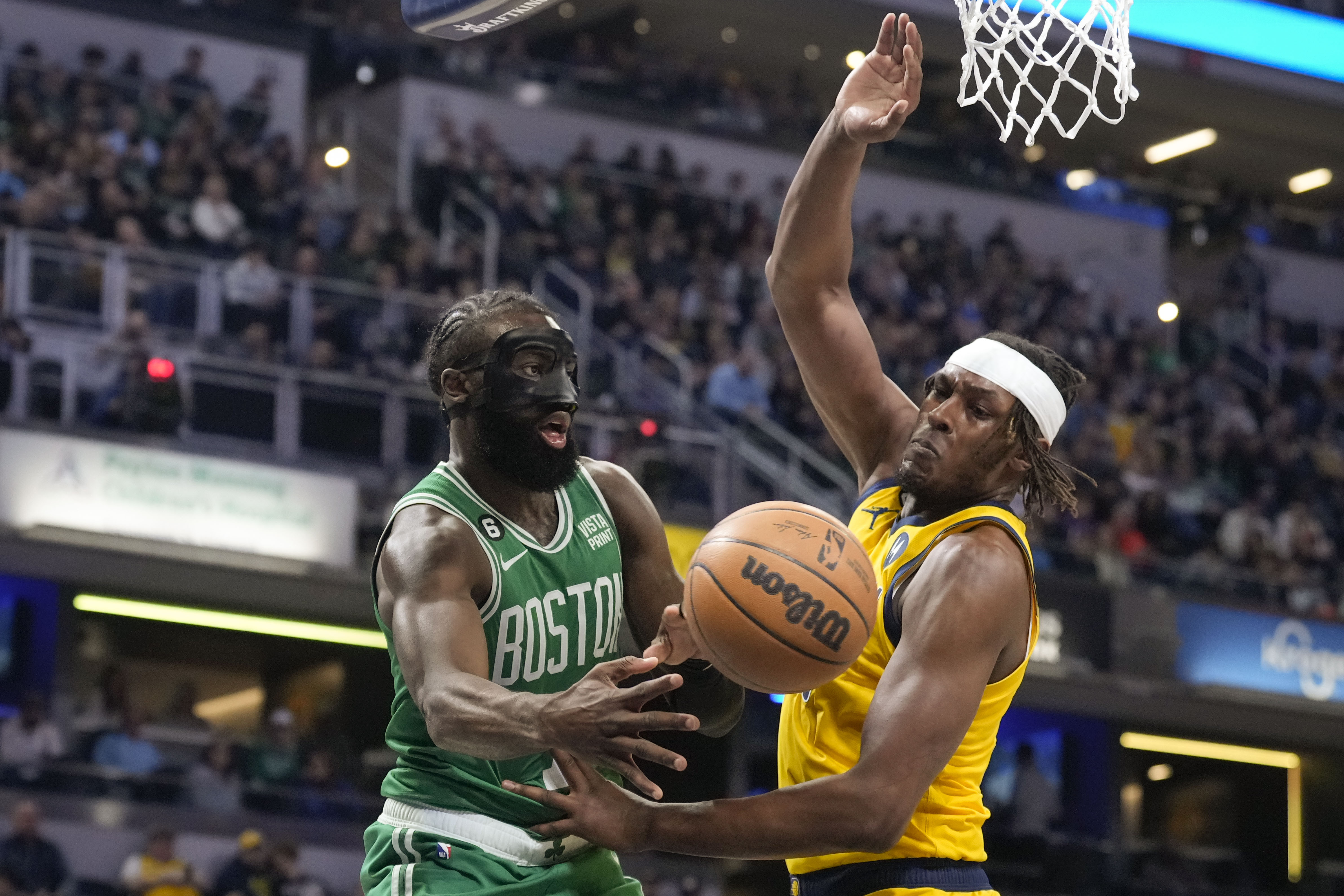 Why is Jaylen Brown wearing a face mask?