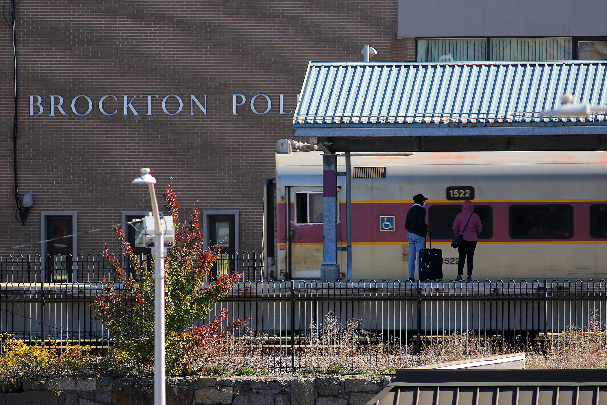 An MBTA commuter rail train pulls into the station in Brockton.
