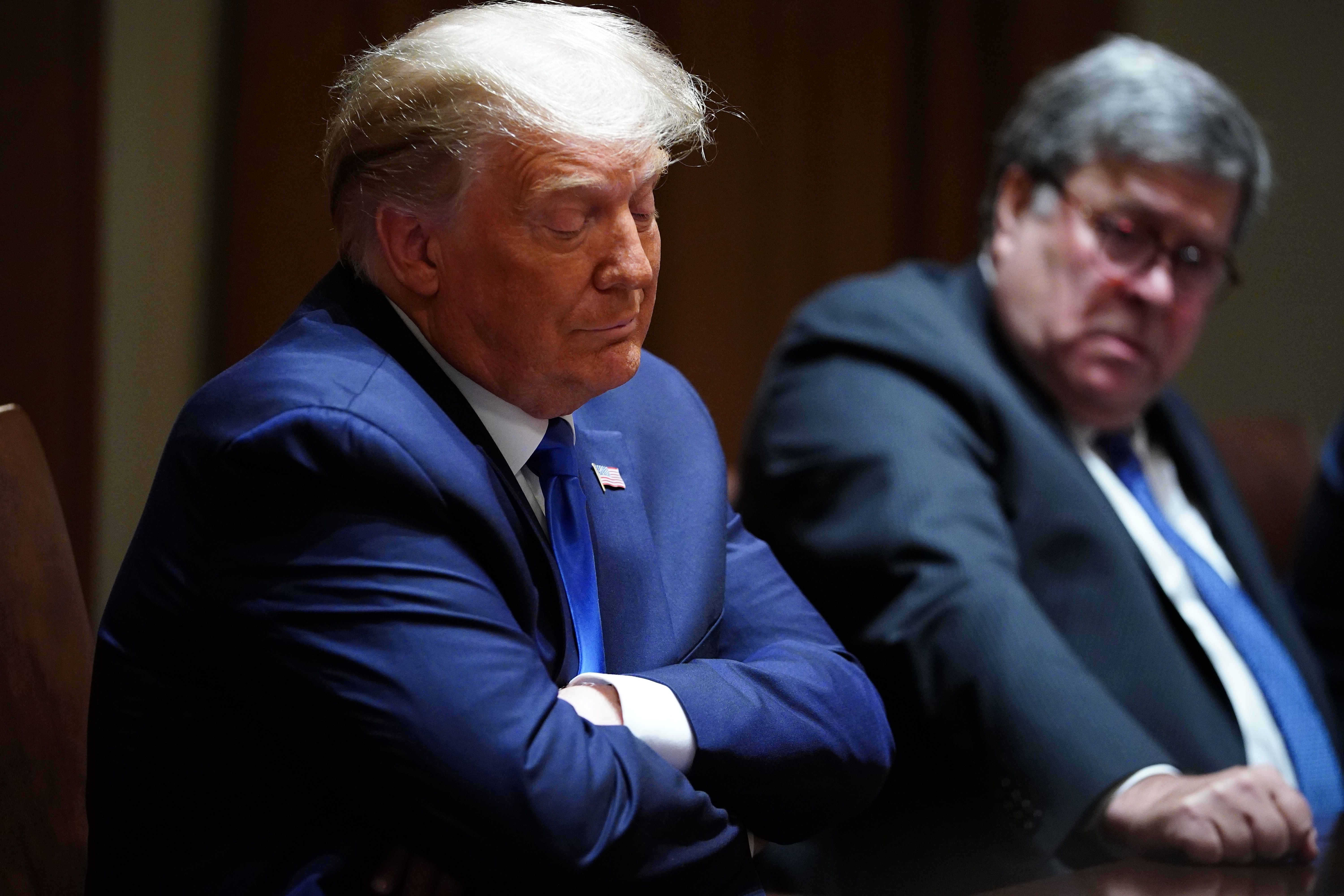 Donald Trump and William Barr.