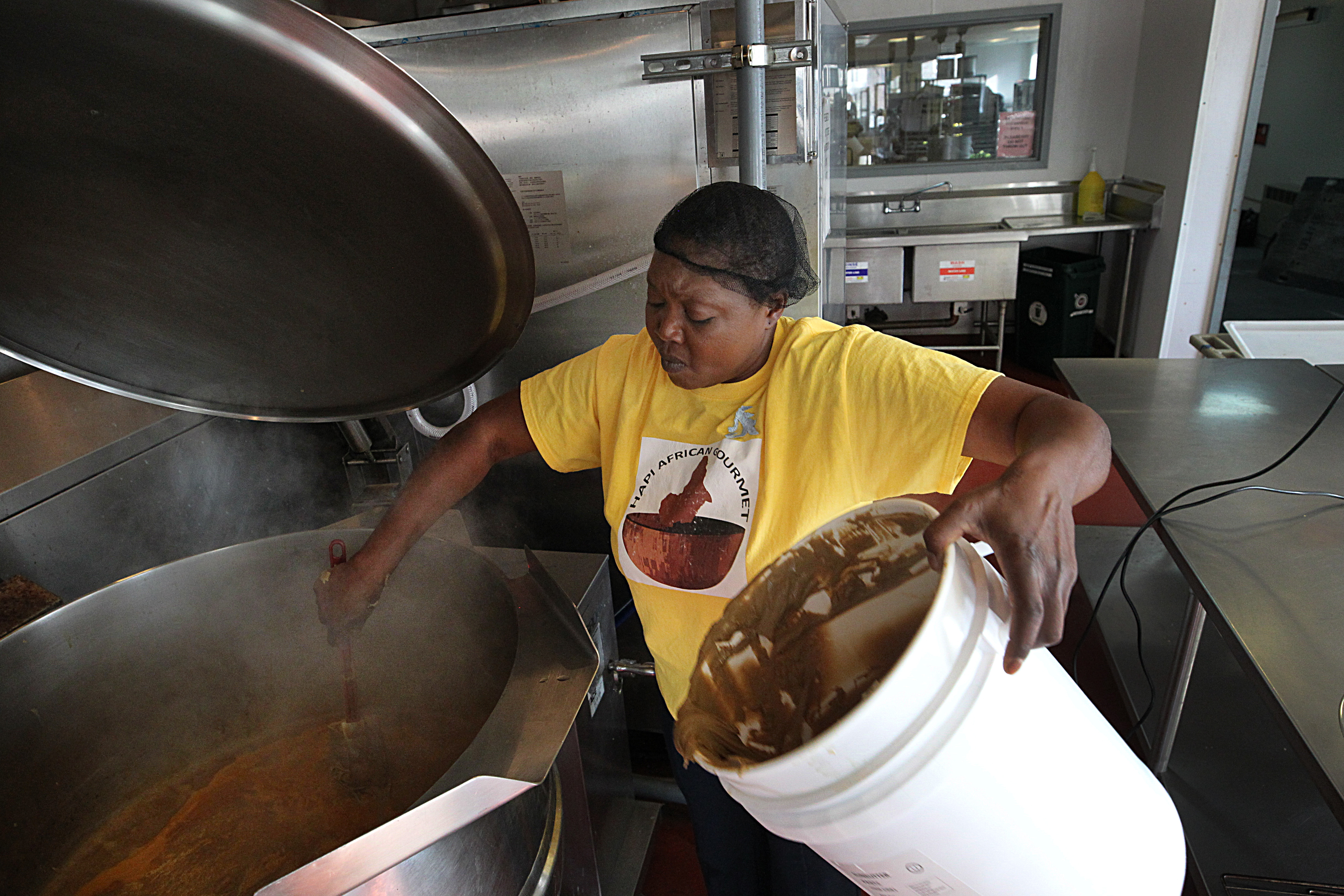 Paulette Ngachoko, owner of Hapi African Gourmet, produced a sauce for UMass at CommonWealth Kitchen.