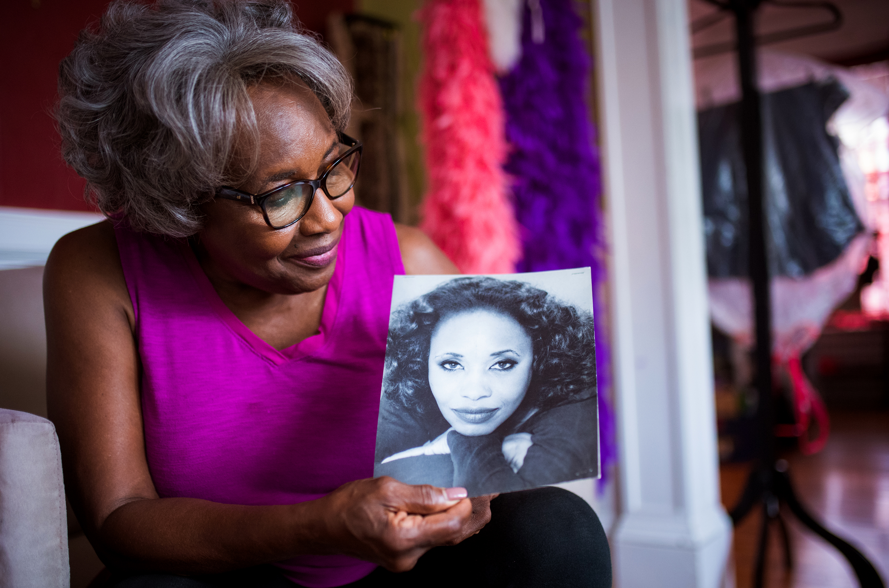 Award winning actress and Trinity Repertory Theater alumna Rose Weaver holds a headshot of herself at her home in Providence.