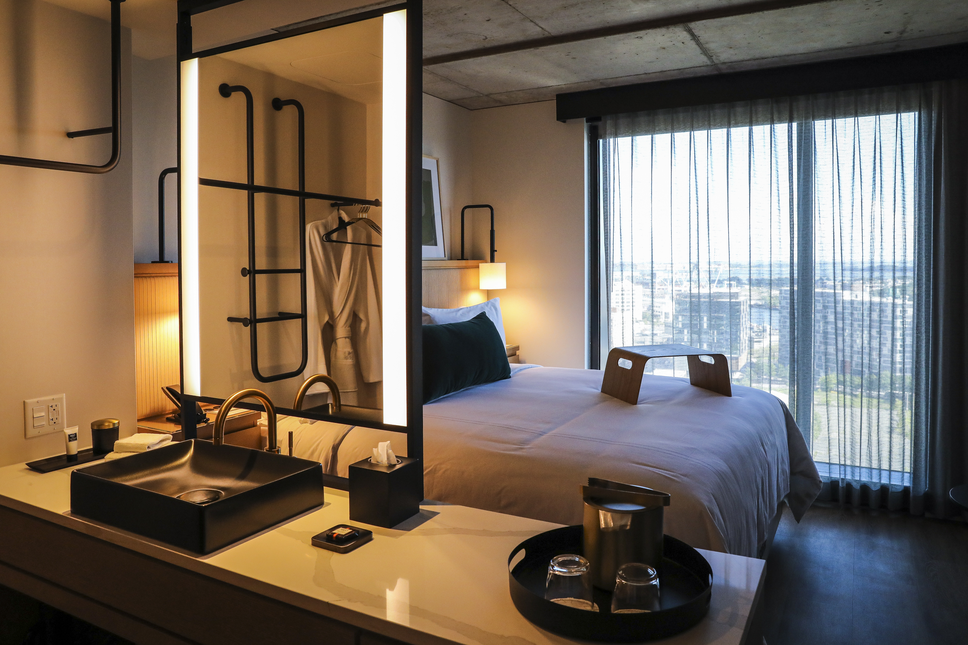 A loft-style guest room at the new Omni Seaport Hotel.