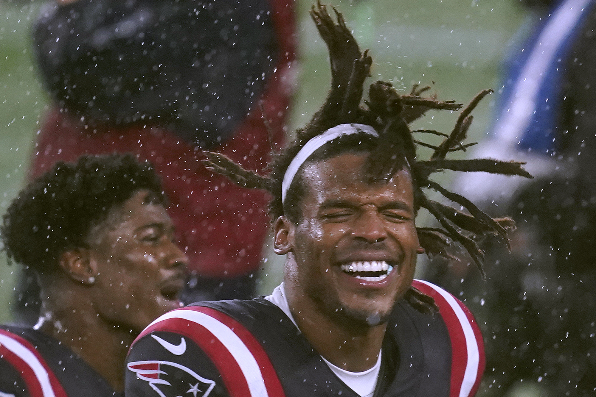 Cam Newton helps Patriots beat Ravens in rain and wind