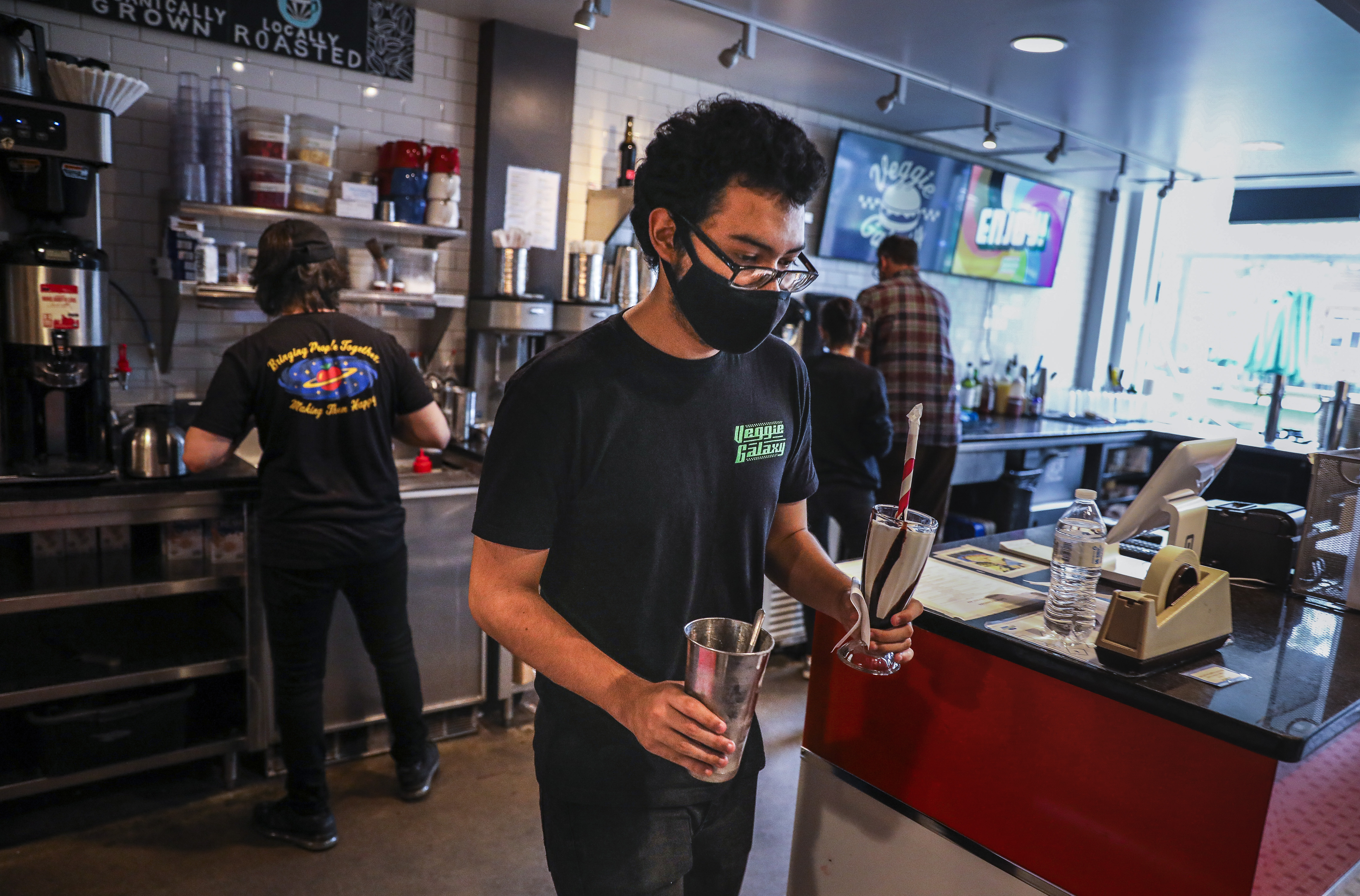 Alex Aviles delivered milkshakes during the Friday afternoon rush at Veggie Galaxy.