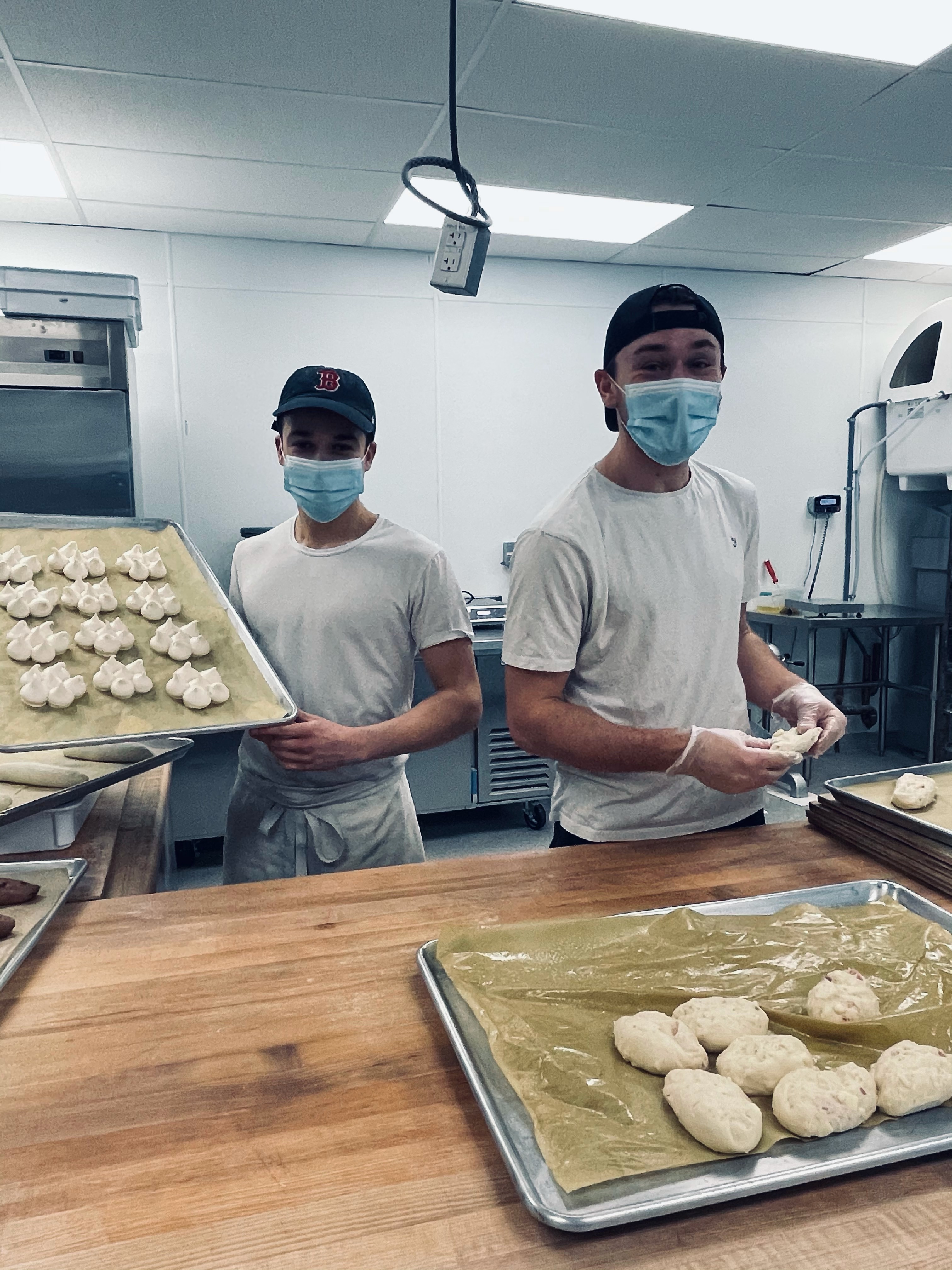 Valentin Beddiar and Noé Doucet, bakers at Colette Bakery in Medford.
