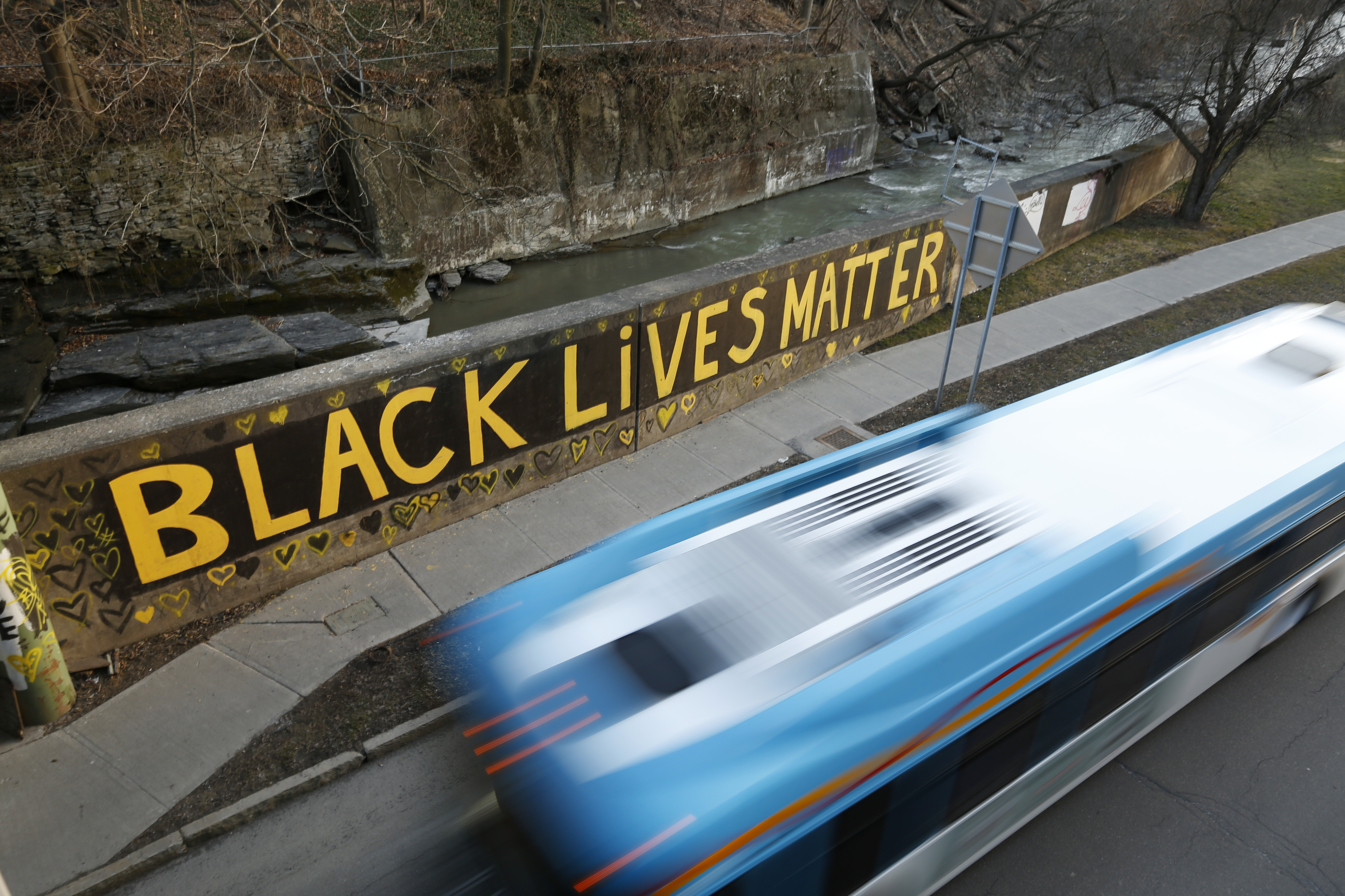 Black Lives Matter is seen along East Green Street in Ithaca, N.Y. The city has approved a plan that will replace its 63-officer police force with an entirely new agency.