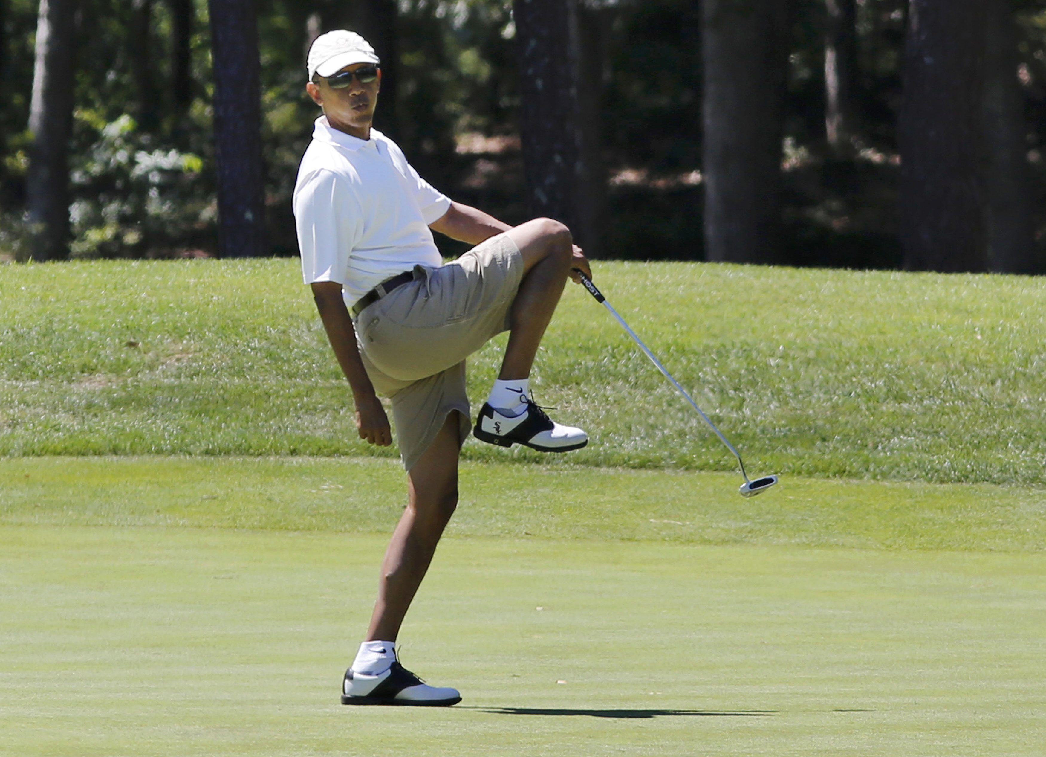 In 2013, President Barack Obama reacts after missing a putt on the first green at the Farm Neck Golf Club at Oak Bluffs on Marthas Vineyard.