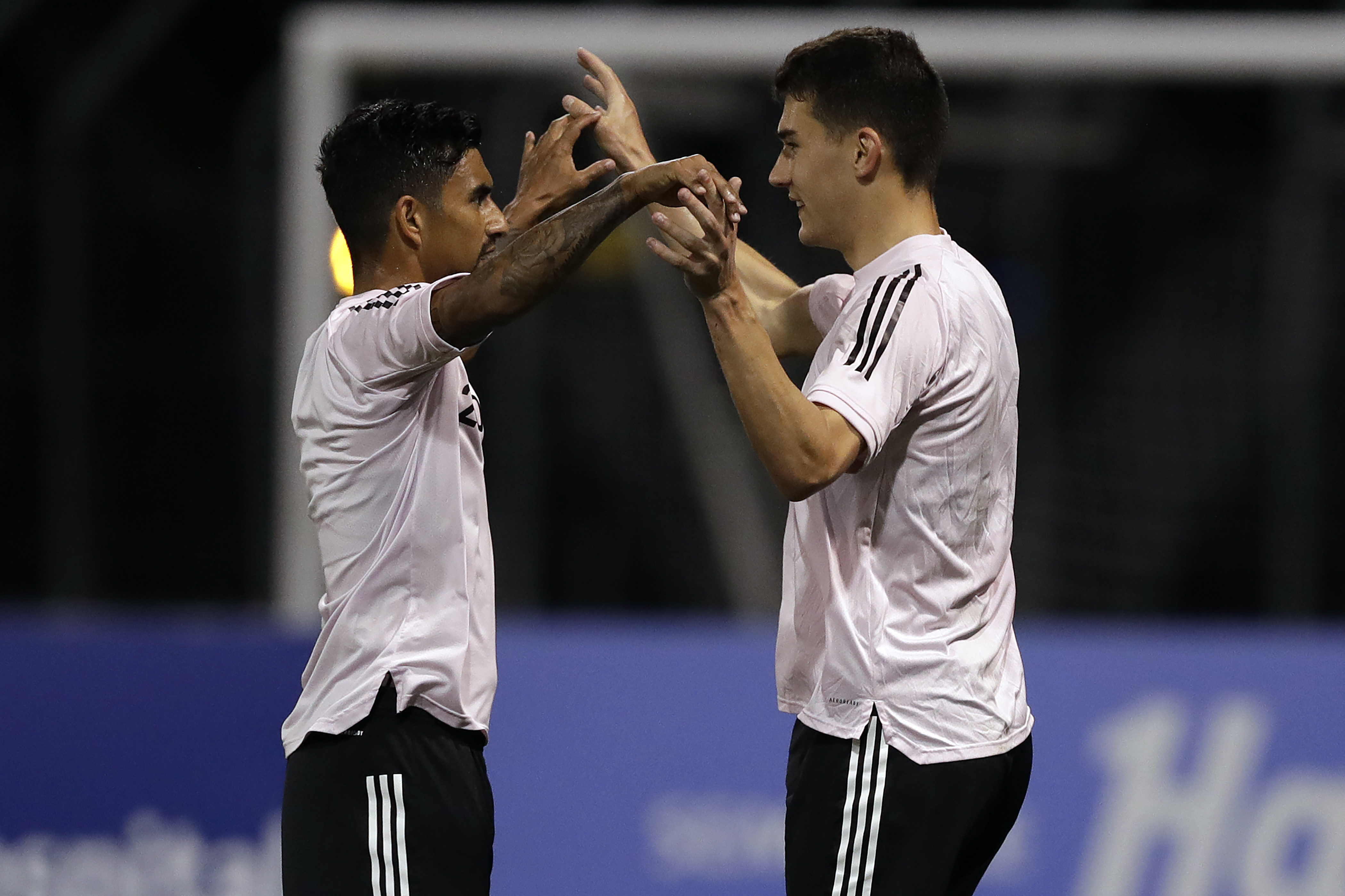 A.J. DeLaGarza, left, celebrates a goal with Inter Miami FC teammate Robbie Robinson during a 2020 game against Tampa.