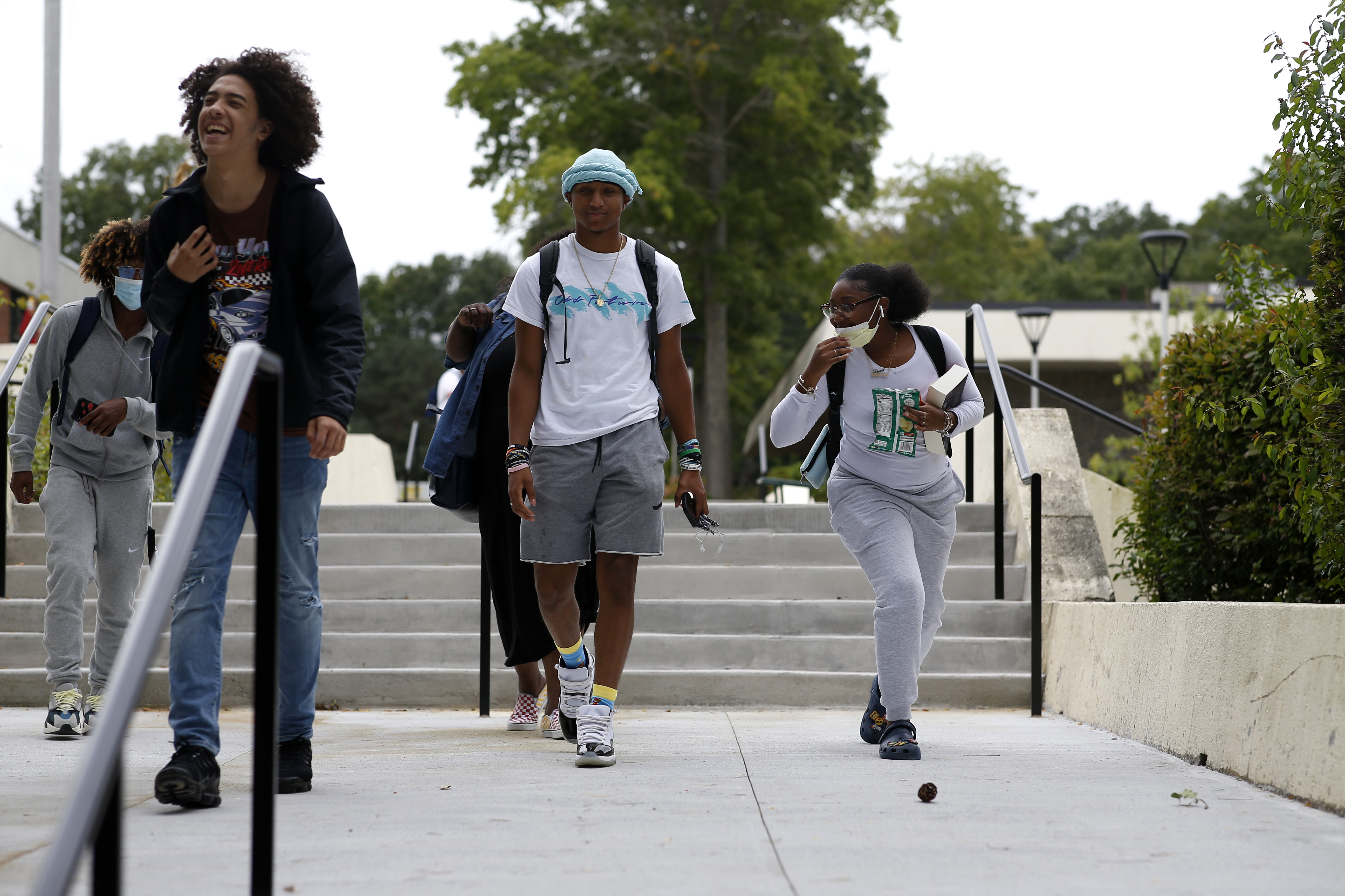 Students make their way on the Brockton campus of Massasoit Community College.