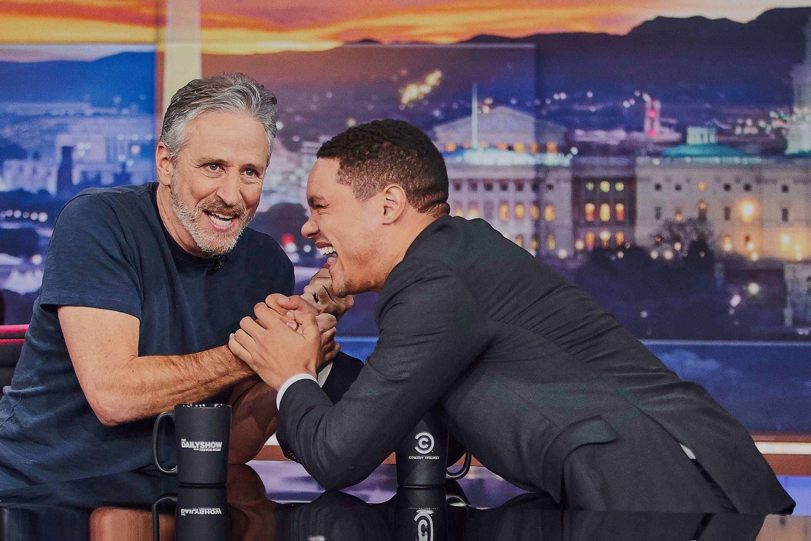 Jon Stewart, left, and Trevor Noah on "The Daily Show."