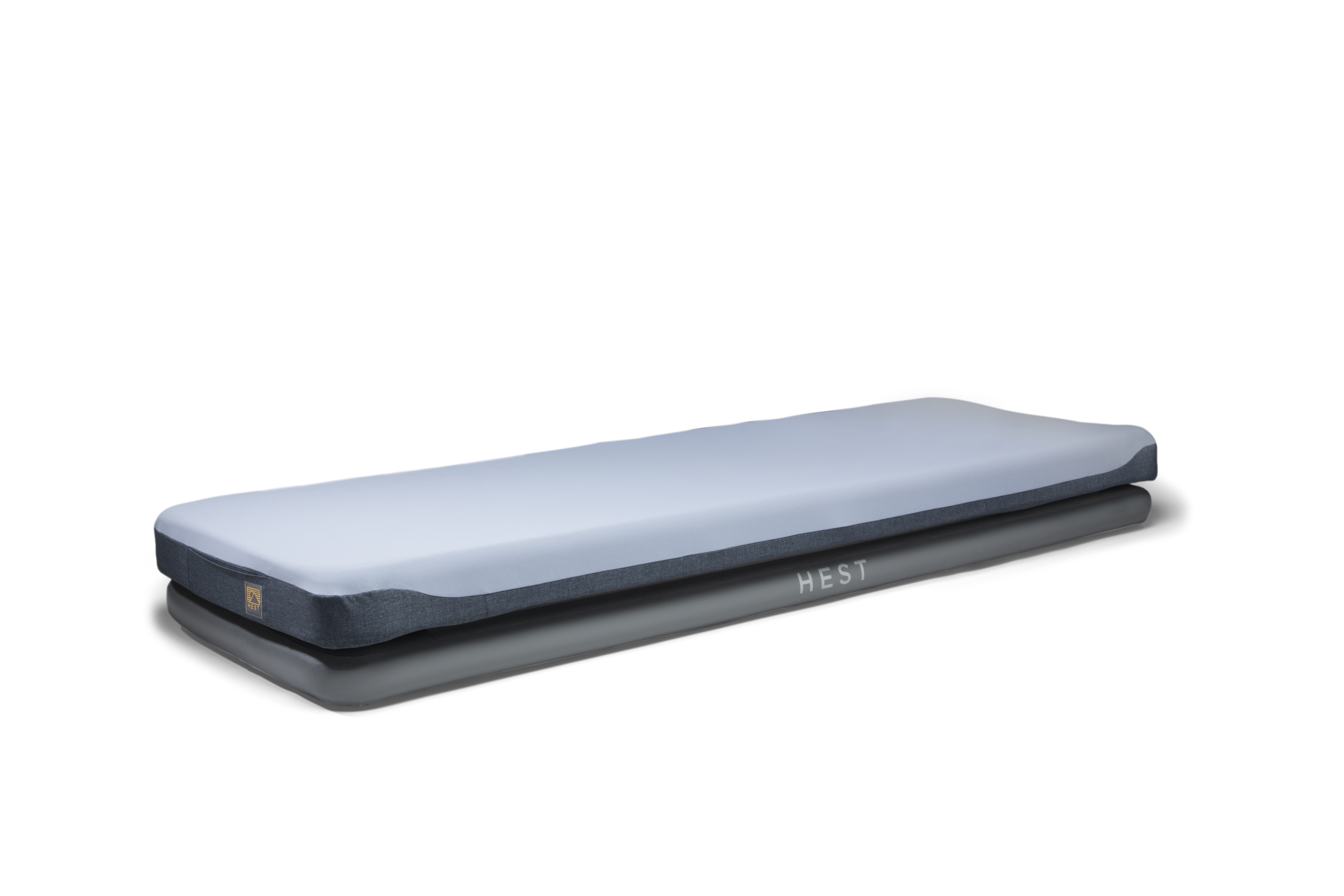 Hest’s Sleep System has a two-layer polyfoam mattress (with a removable and washable mattress cover) over an inflatable base, providing the perfect blend of rigidity and cushiness.