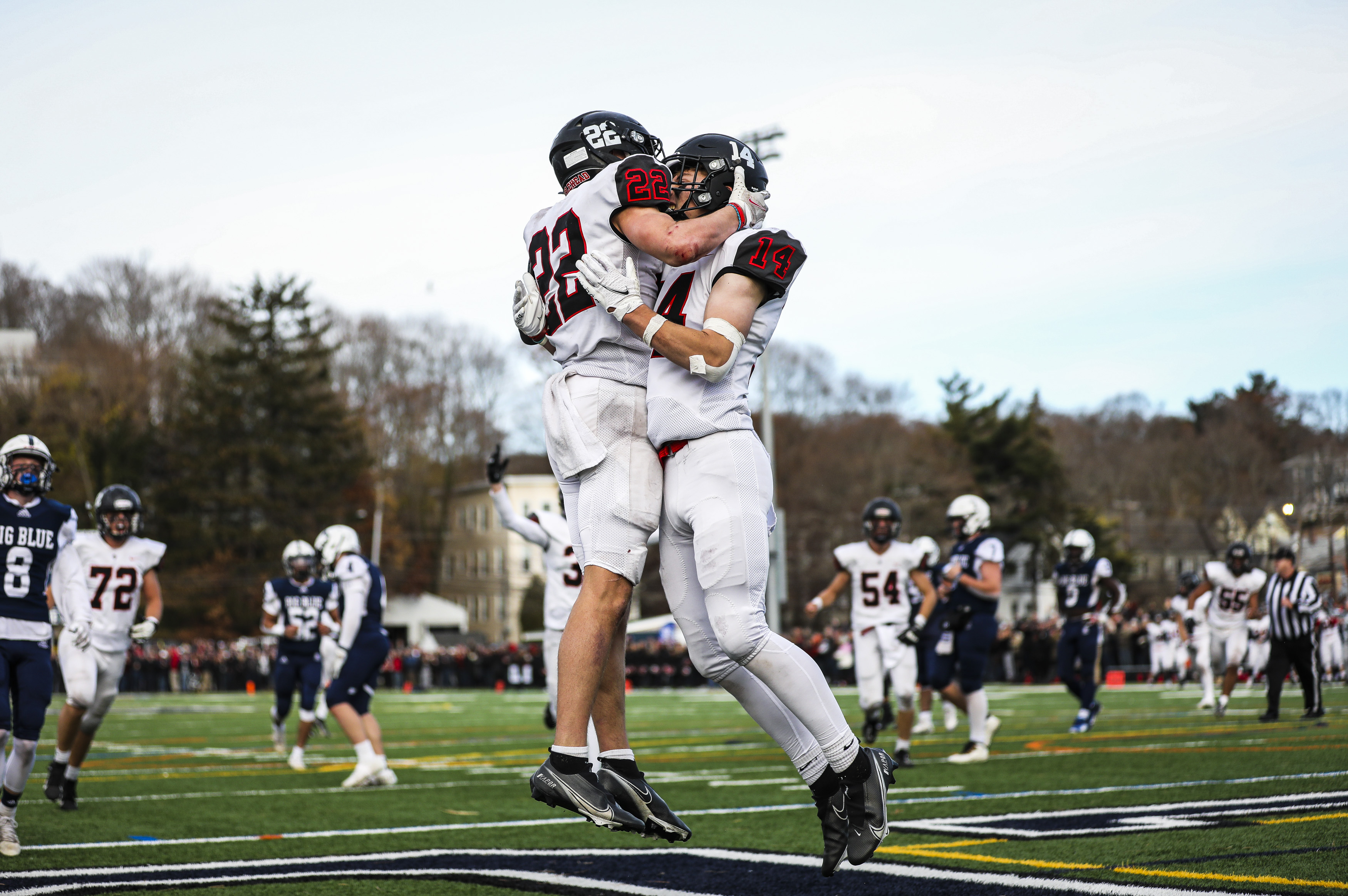 Marblehead’s Connor Cronin (22) and teammate Shane Keough were flying high after a touchdown in their win over Swampscott.