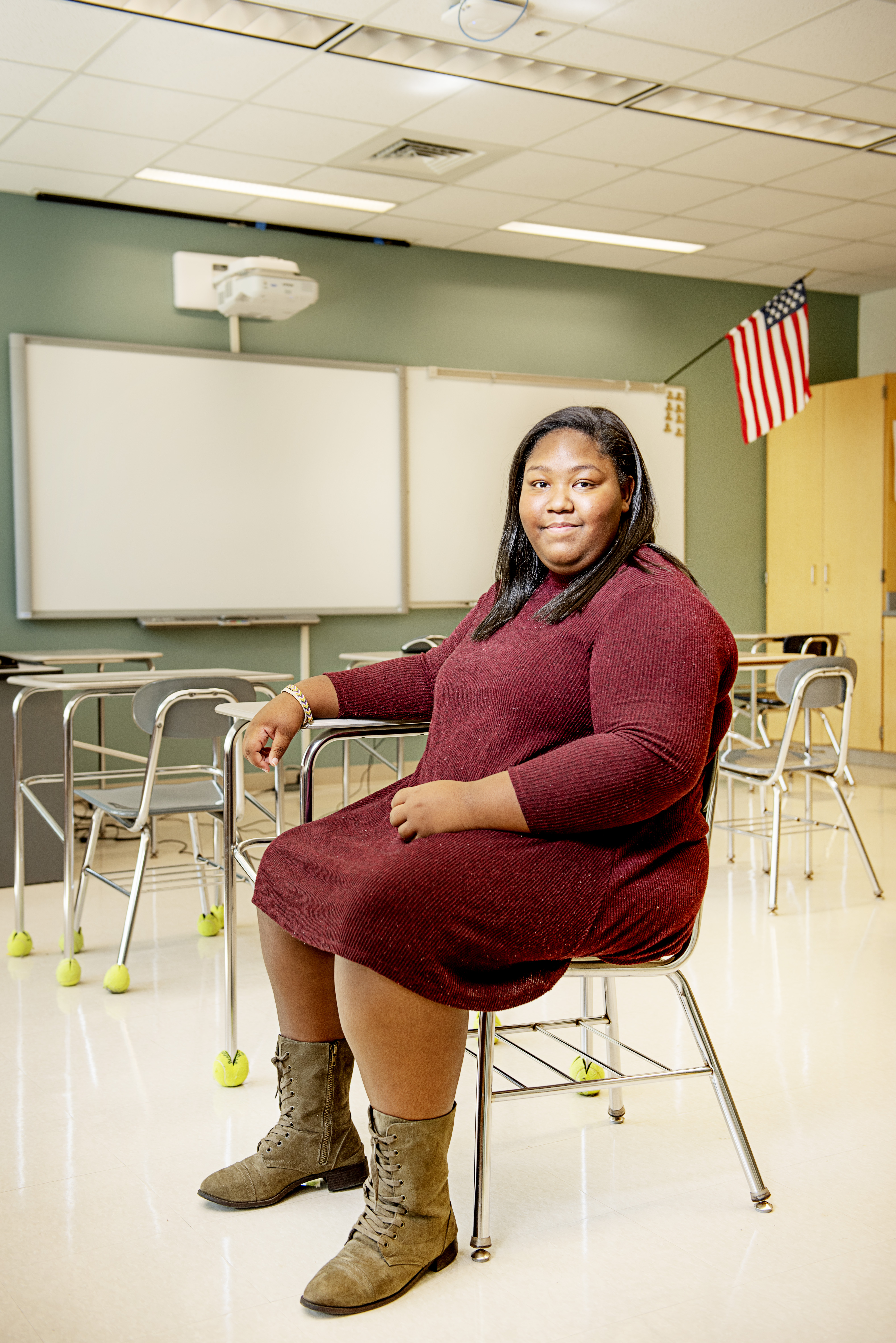 Janai Carrington in a classroom at Bedford High School, which the Boston resident attends via the METCO program.