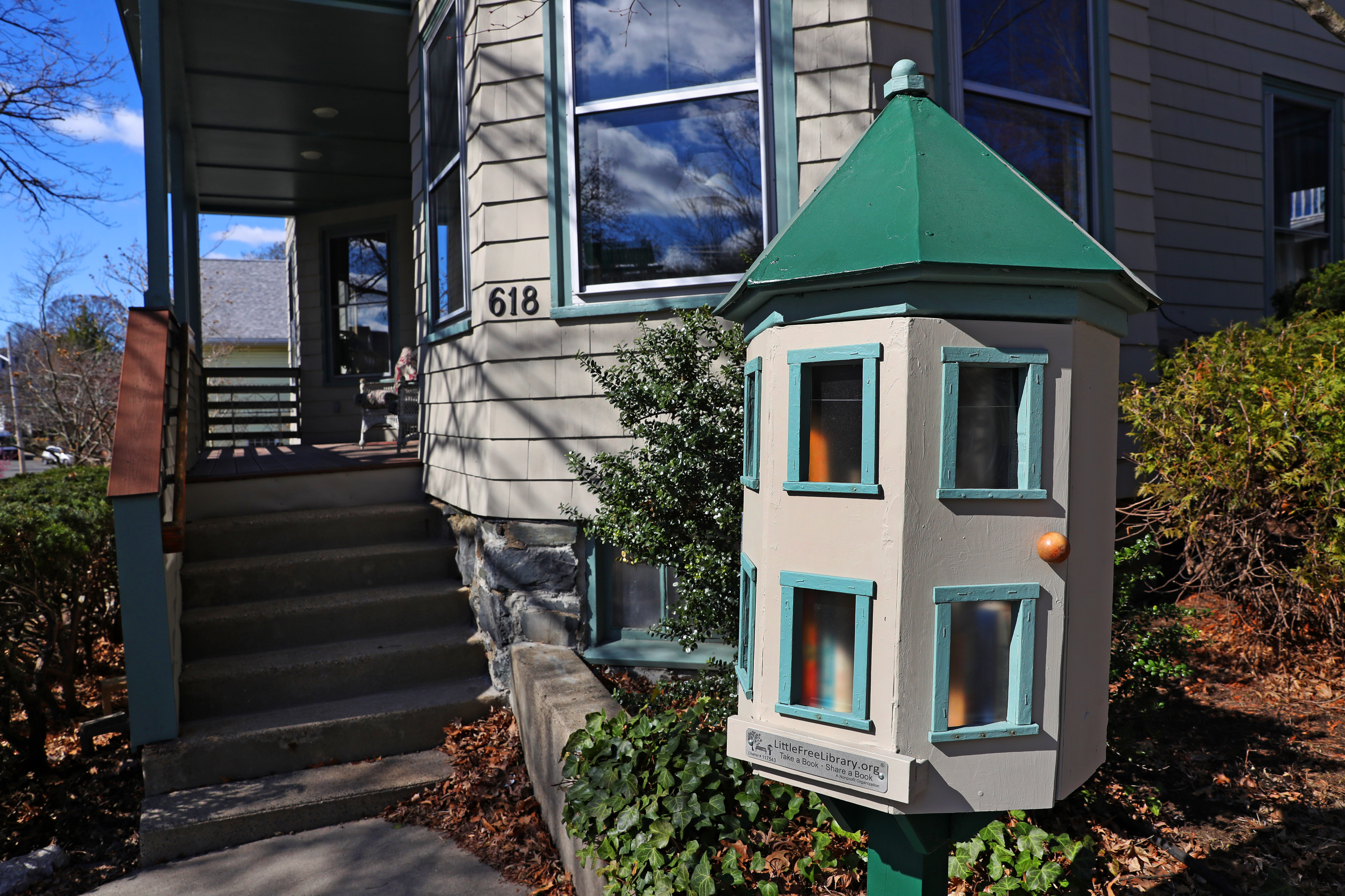 CAMBRIDGE, MA - 4/07/2021:FOR ADDRESS COVER STORY...... A small wooden library house built by Paul E. Fallon is outside the front of his home. Fallon, a homeowner hopes to bring more diversity and affordable housing to Cambridge by bequeathing his multifamily home to a nonprofit instead of his children. He's hoping that others will follow suit. (David L Ryan/Globe Staff ) SECTION:ADDRESS