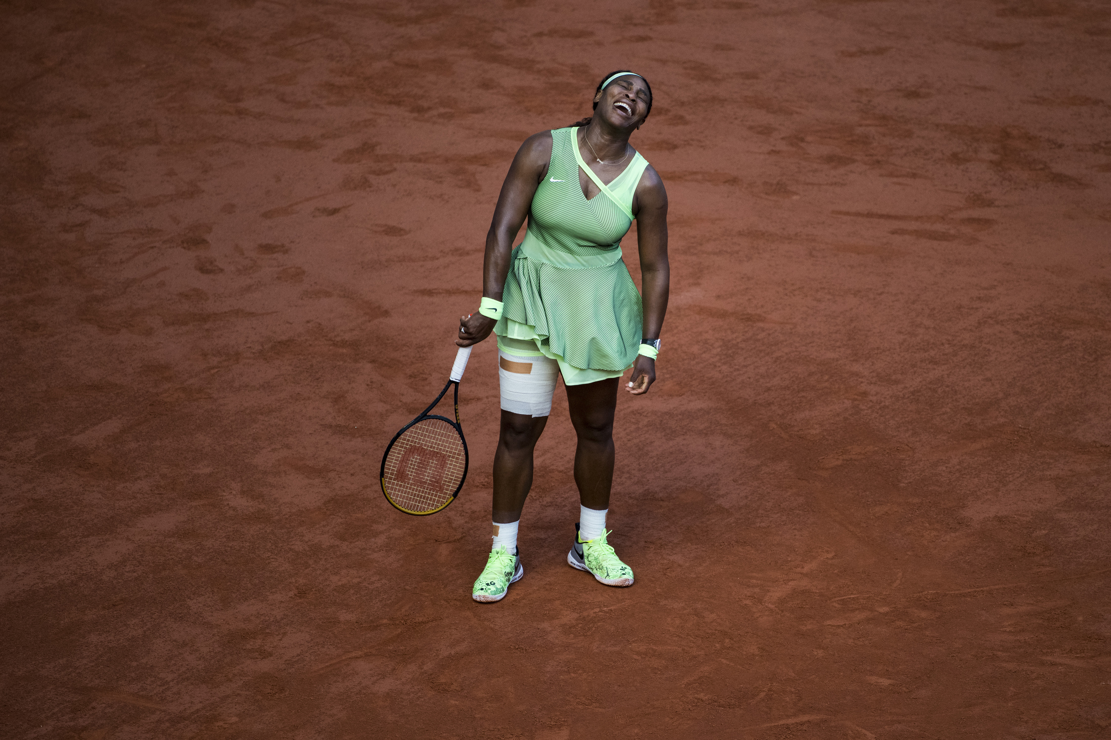 Serena Williams reacts during her fourth-round loss against Elena Rybakina at the French Open Sunday.