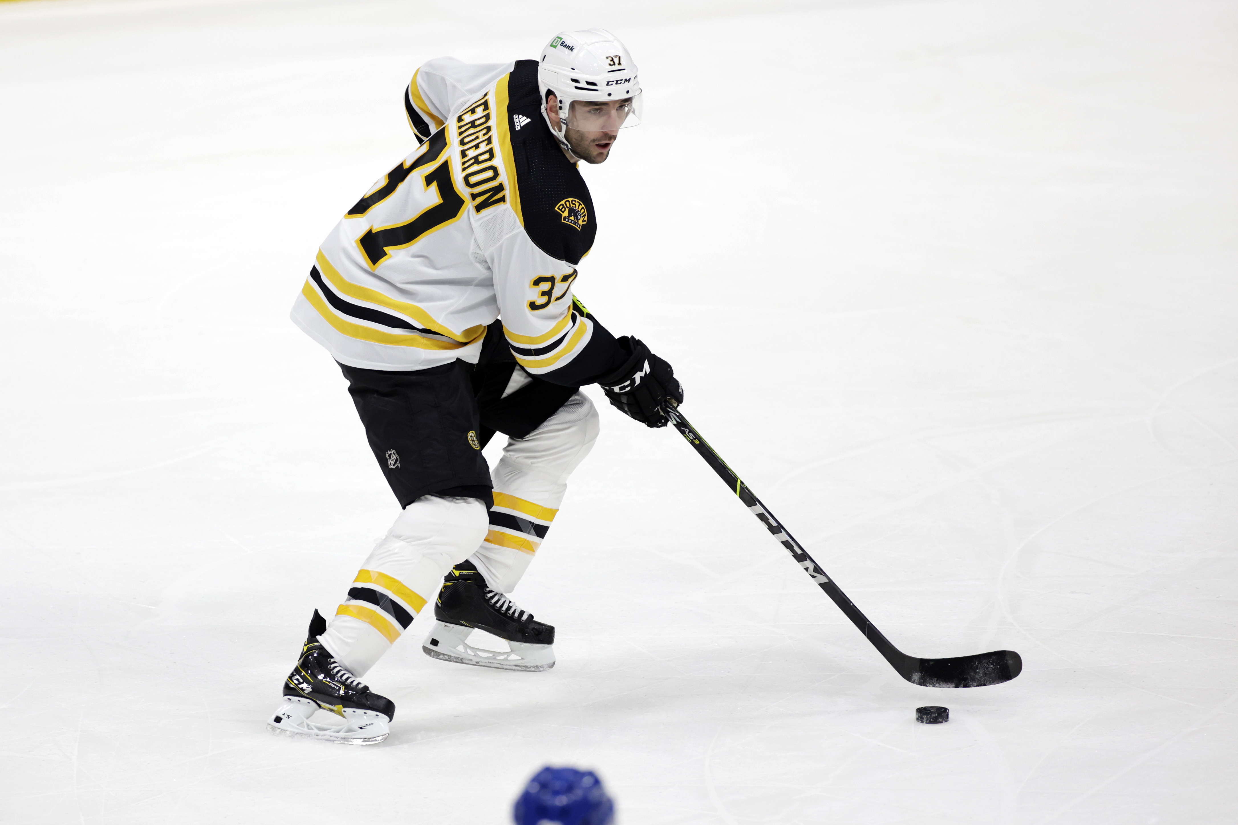 Patrice Bergeron looks for open ice during a recent contest against the Islanders.