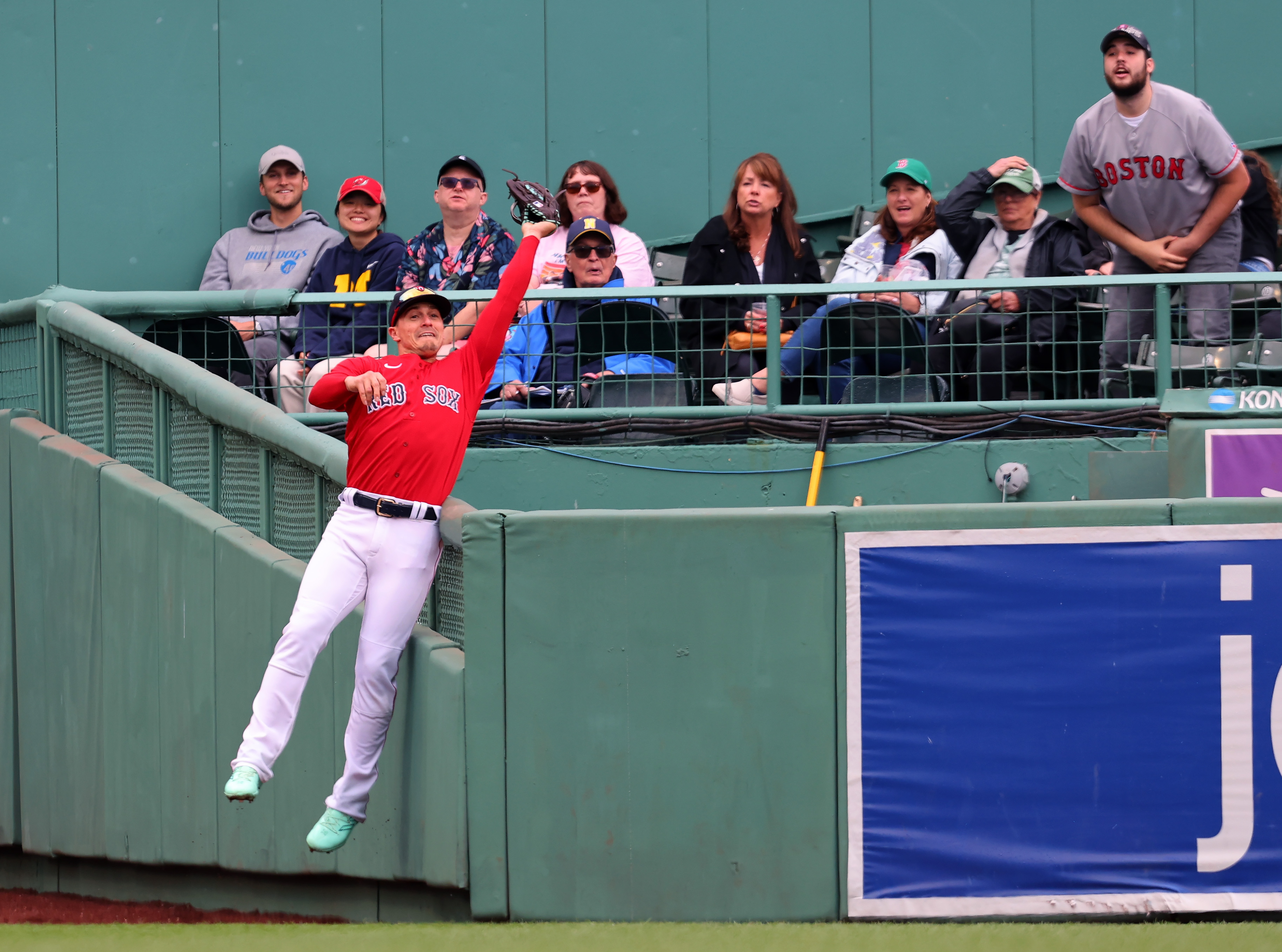 Alex Cora briefly pulls Boston Red Sox off field after fan hits