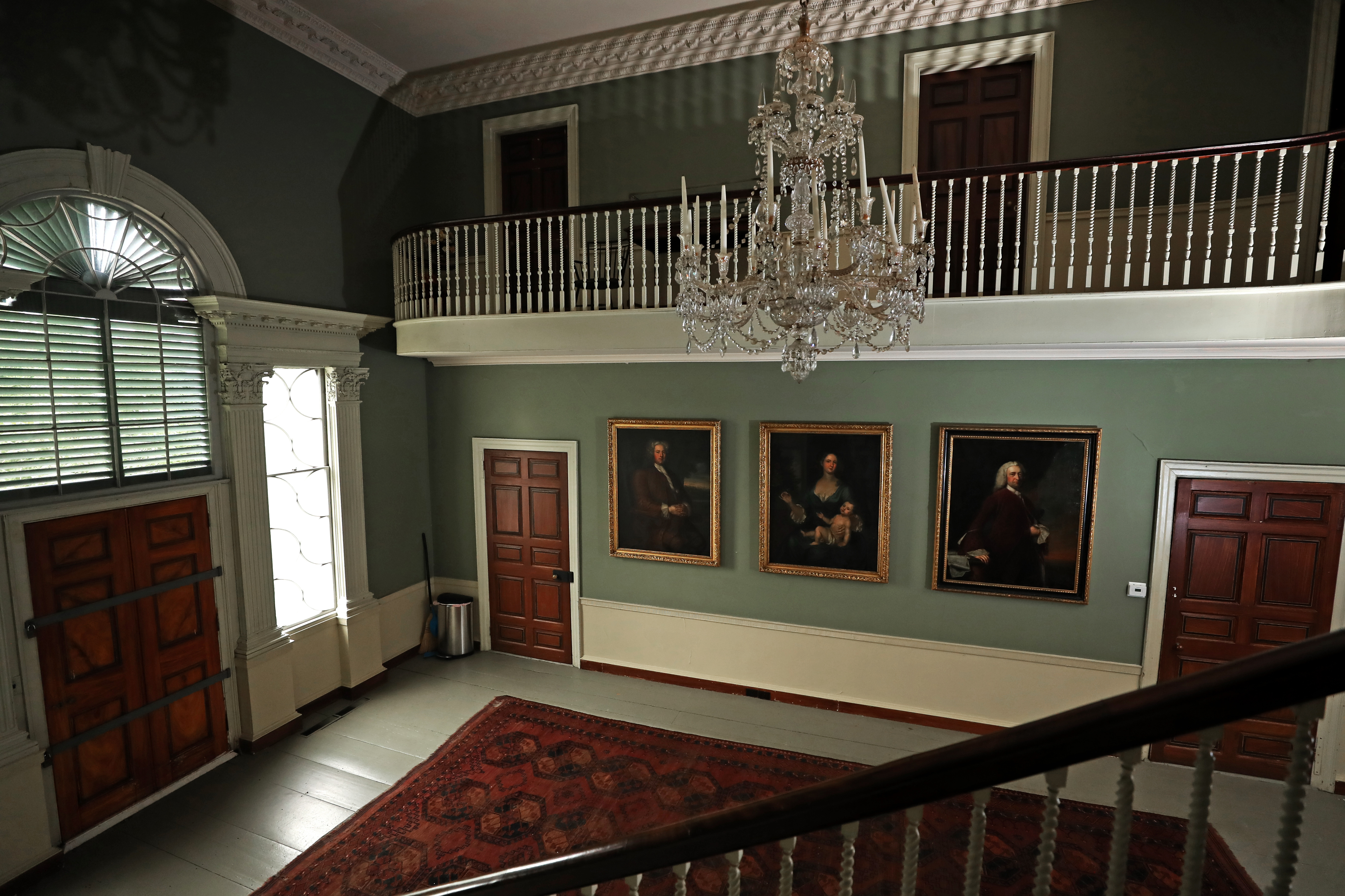 An interior view of the entrance by the stairway at the Shirley-Eustis Place.
