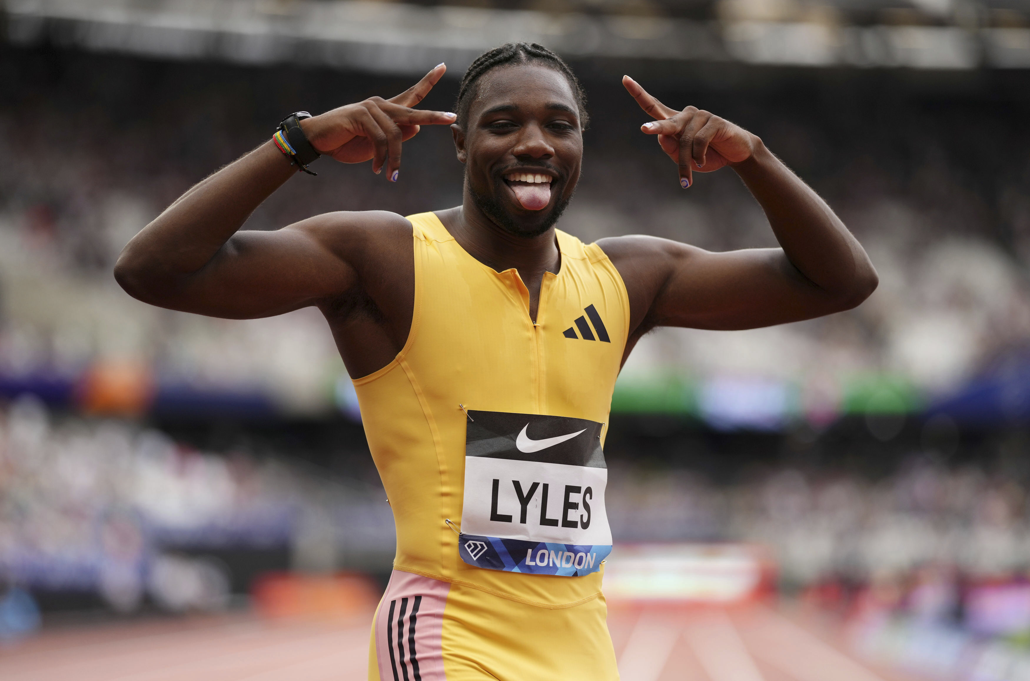 American star Noah Lyles warms up for Olympics by setting personal