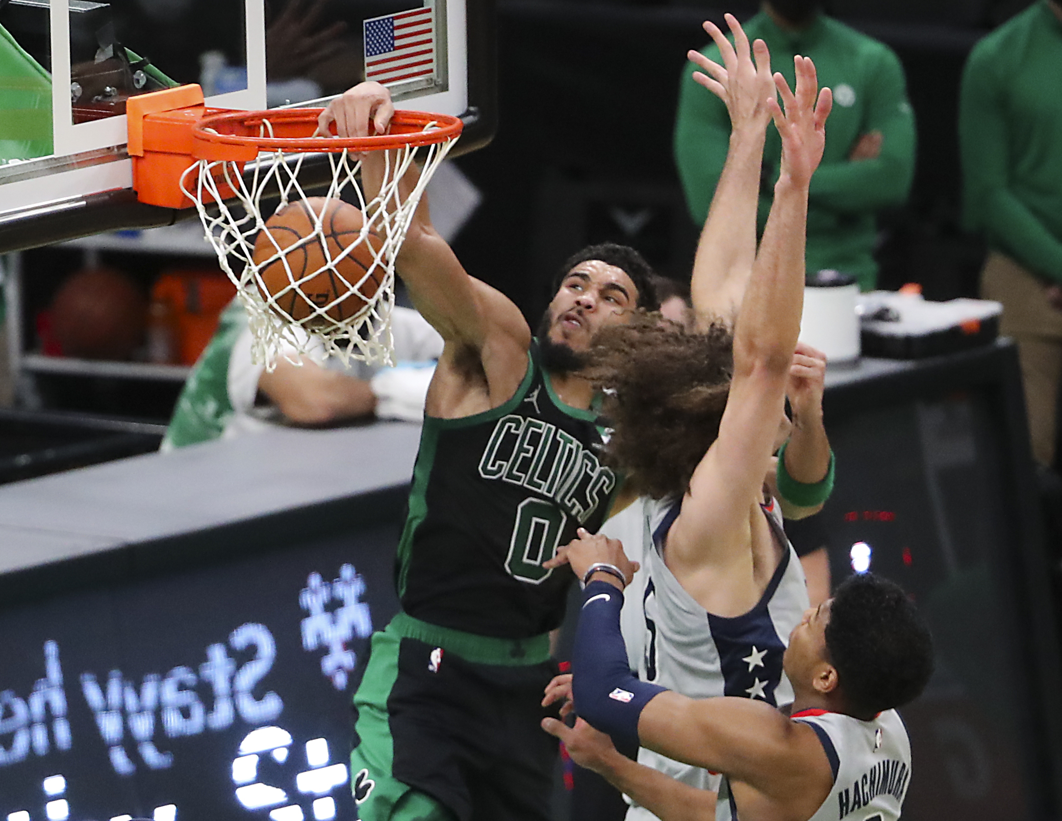 Jayson Tatum posterized Washington's Robin Lopez with a definitive dunk in the second quarter.