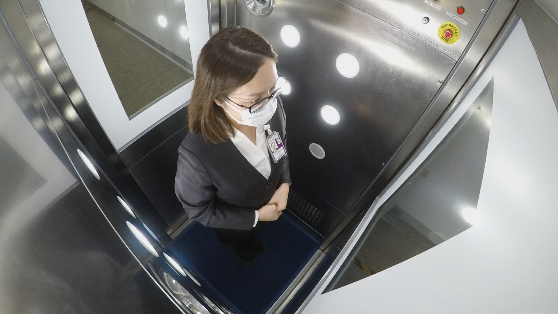 An employee at Hong Kong International Airport stood inside an enclosed chamber that kills 99.99 percent of germs. Travelers using the CleanTech facility will have their temperature checked before entering for the 40-second disinfection and sanitizing procedure.